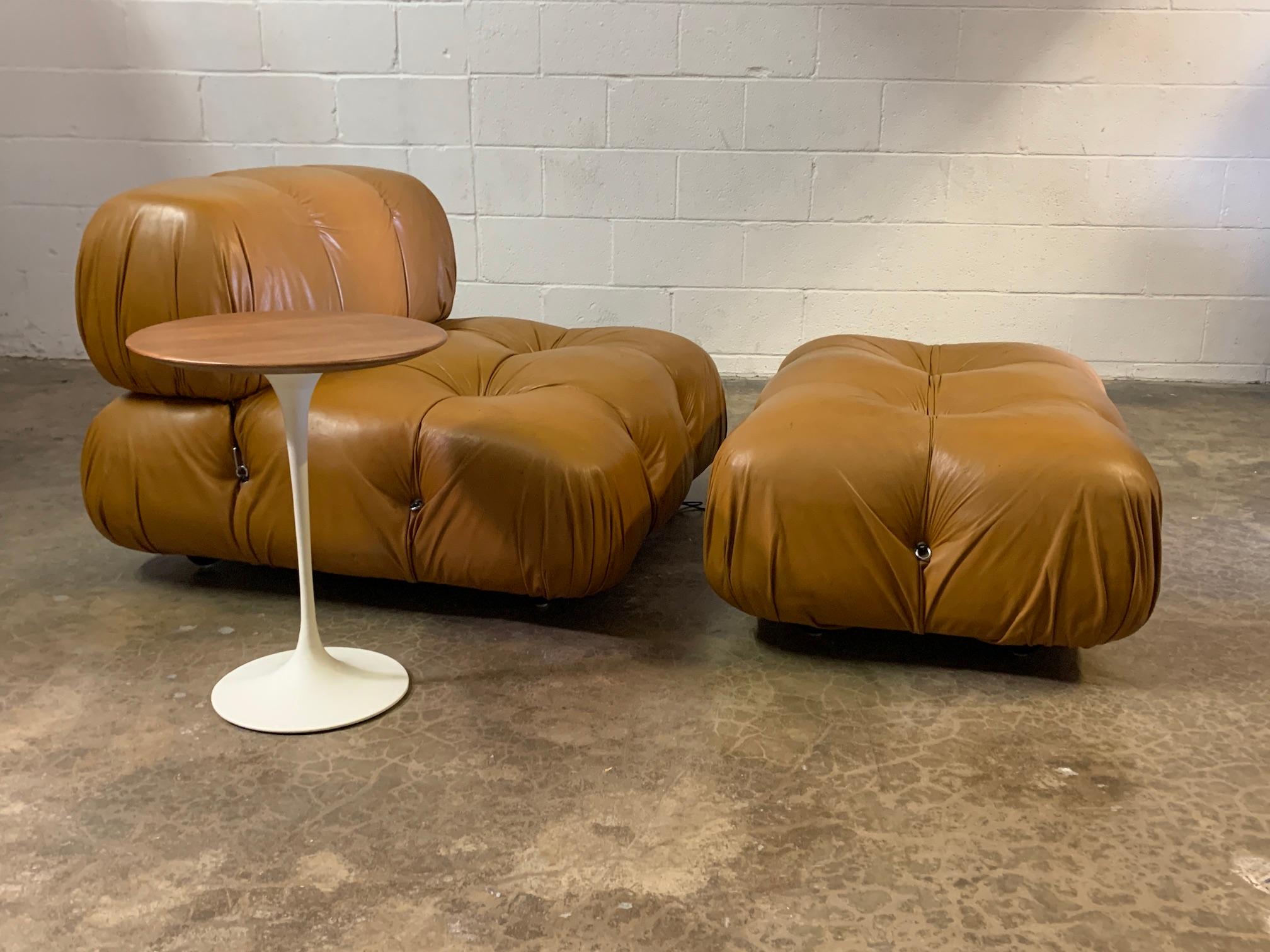 An early walnut top tulip side table designed by Eero Saarinen for Knoll.