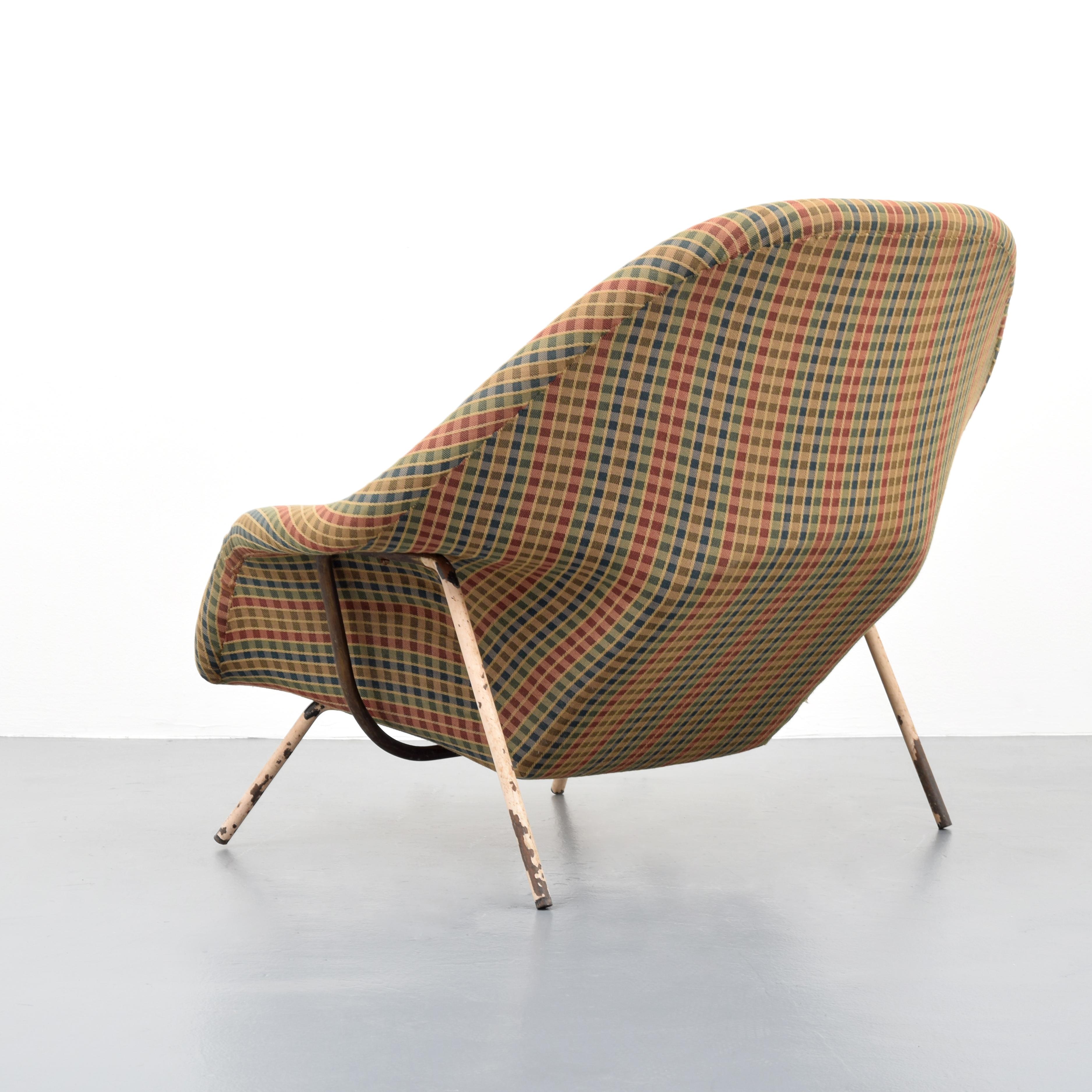 Artist/Designer: Eero Saarinen (Finnish-American, 1910-1961); Knoll

Additional Information: Chair is upholstered in Jack Lenor Larsen fabric.

Marking(s); notes: no marking(s) apparent

Country of origin; materials: USA; enameled steel,
