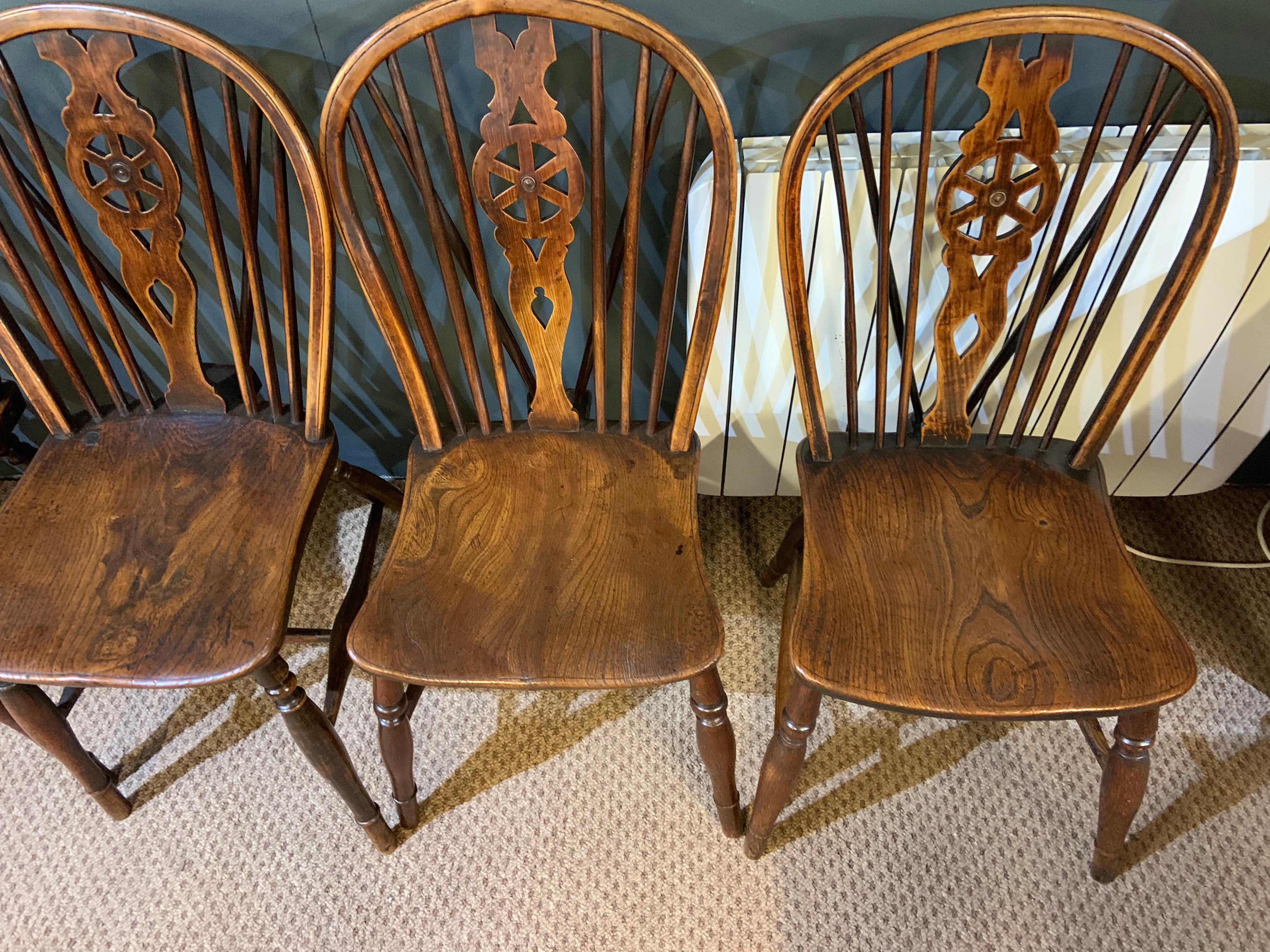 British Early Eight 19th Century Windsor Wheel Back Chairs