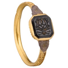 Early Eighteenth-Century Gold Mourning Ring with Monogram and Vanitas Device.
