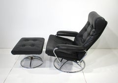 Sedia da salotto in pelle Ekornes con ottomano Norvegia