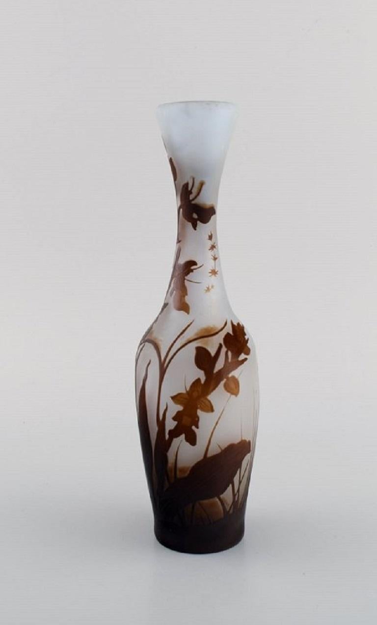 Early Emile Gallé vase in frosted and brown art glass carved with motifs in the form of foliage. Early 20th century.
Measures: 23 x 9 cm.
In excellent condition.
Signed.