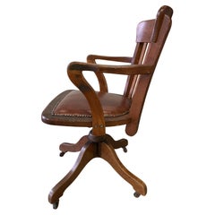 Sedia da scrivania girevole in pelle con schienale in quercia di Oak del primo Novecento inglese