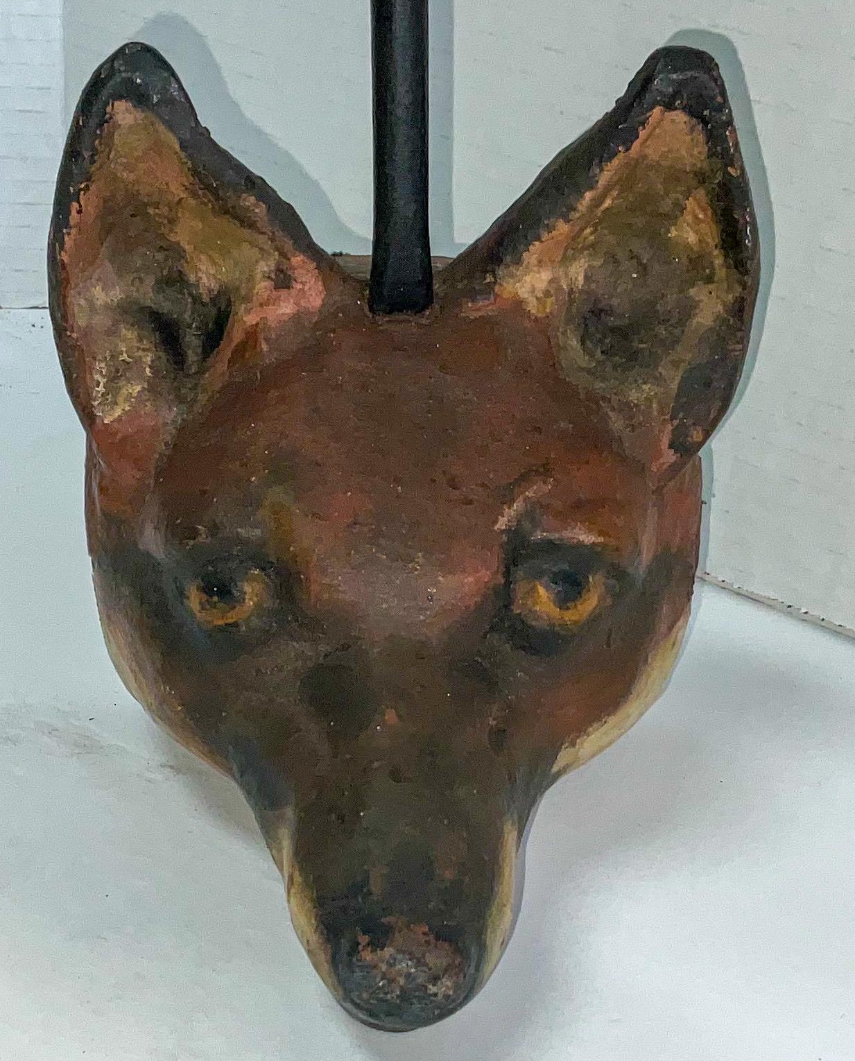 I have seen the brass version of this doorstop many times, but never the early cast iron version! It is a cast iron fox from painted doorstop in very good antique condition. It captures the hunt and hound theme perfectly!