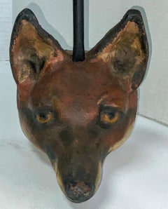 Butoir de porte en fonte peint en forme de renard pour la chasse et les chiens de chasse.