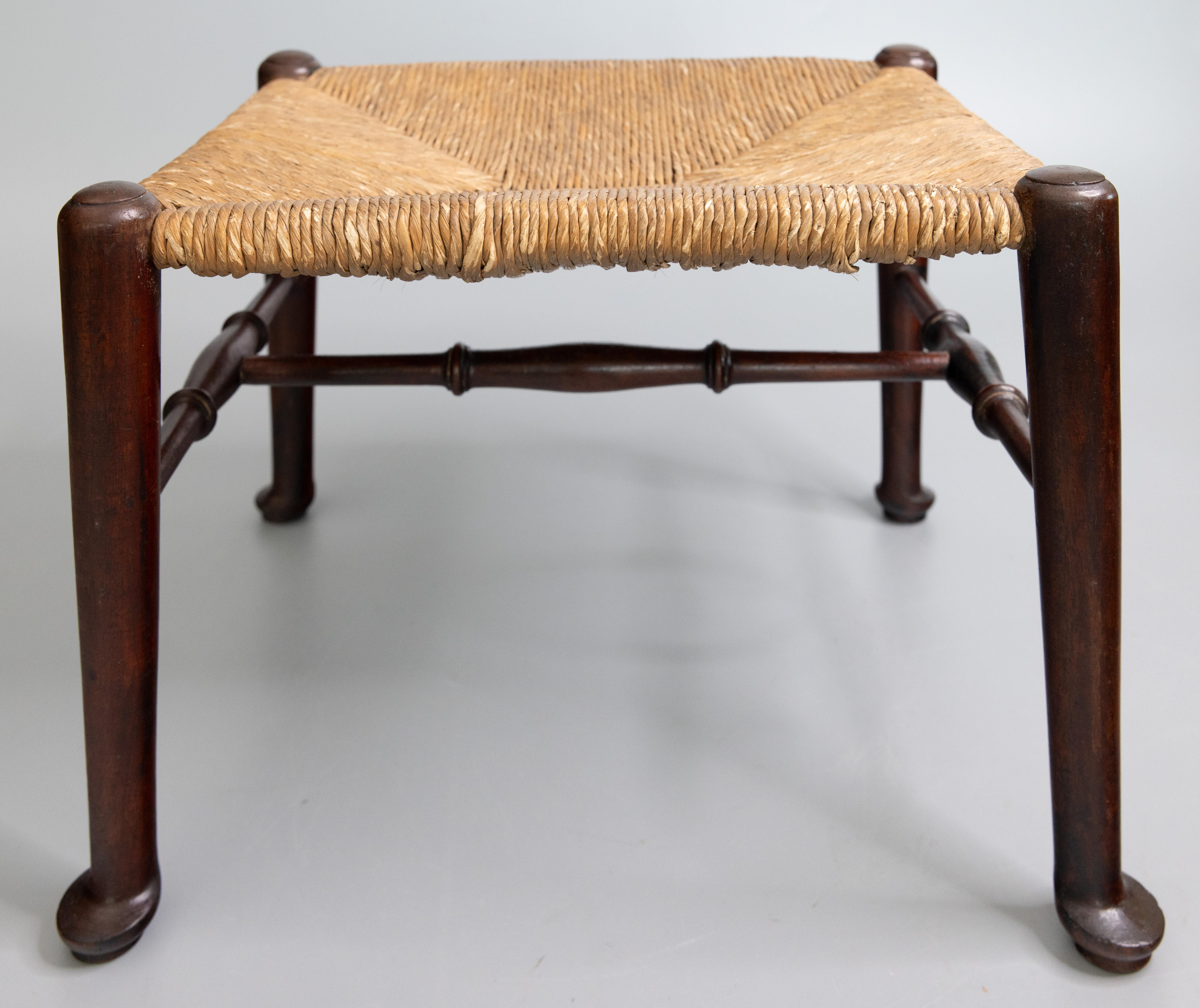 A superb English oak stool / footstool with hand turned legs and stretchers and hand woven rush seat, circa 1910. This charming stool would make a wonderful foot rest.

DIMENSIONS
14.75ʺW × 12.5ʺD × 10.25ʺH