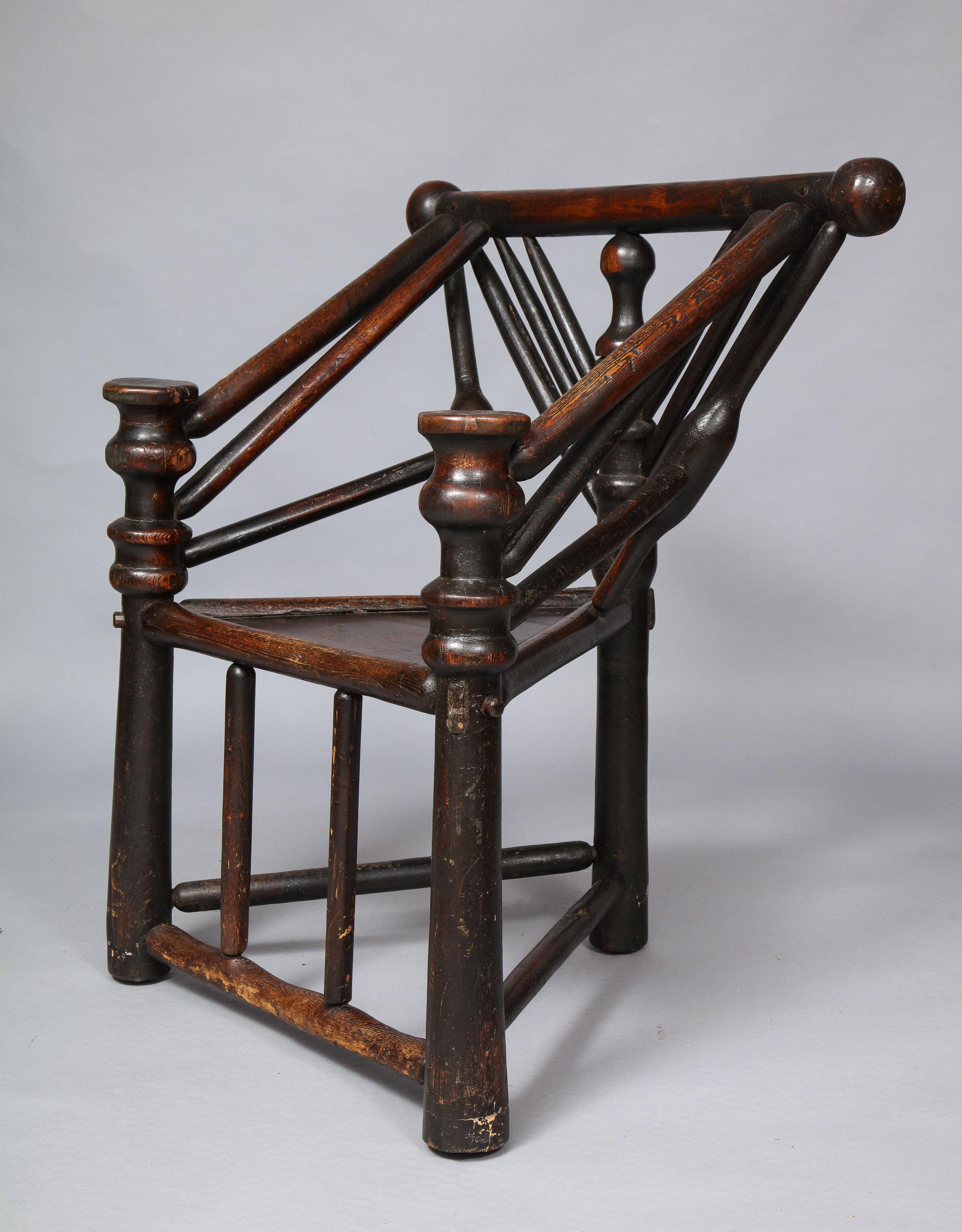 Rare Elizabethan or Jacobean turned fruitwood and ash three legged chair, often referred to as a 