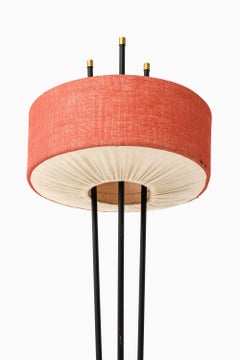 Lampada da terra in metallo laccato nero e ottone di Gerald Thurston, anni '50