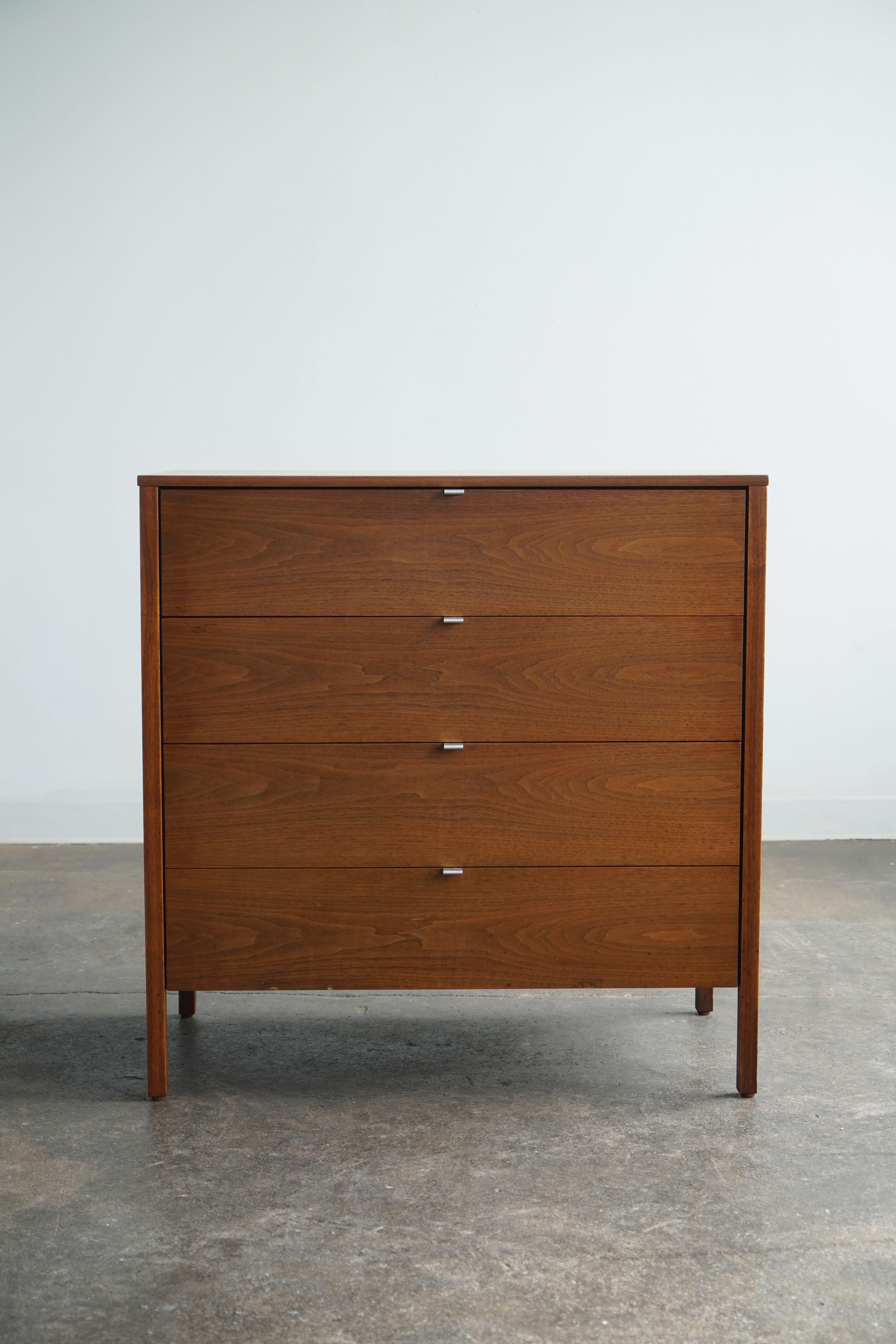 Florence Knoll Walnut 34-drawer dresser for Knoll International. 
Circa 1960's
Walnut with chrome plated steel drawers pulls

The pieces have clean, simple lines and have a robust construction, much like all the pieces she designed. 

Condition: