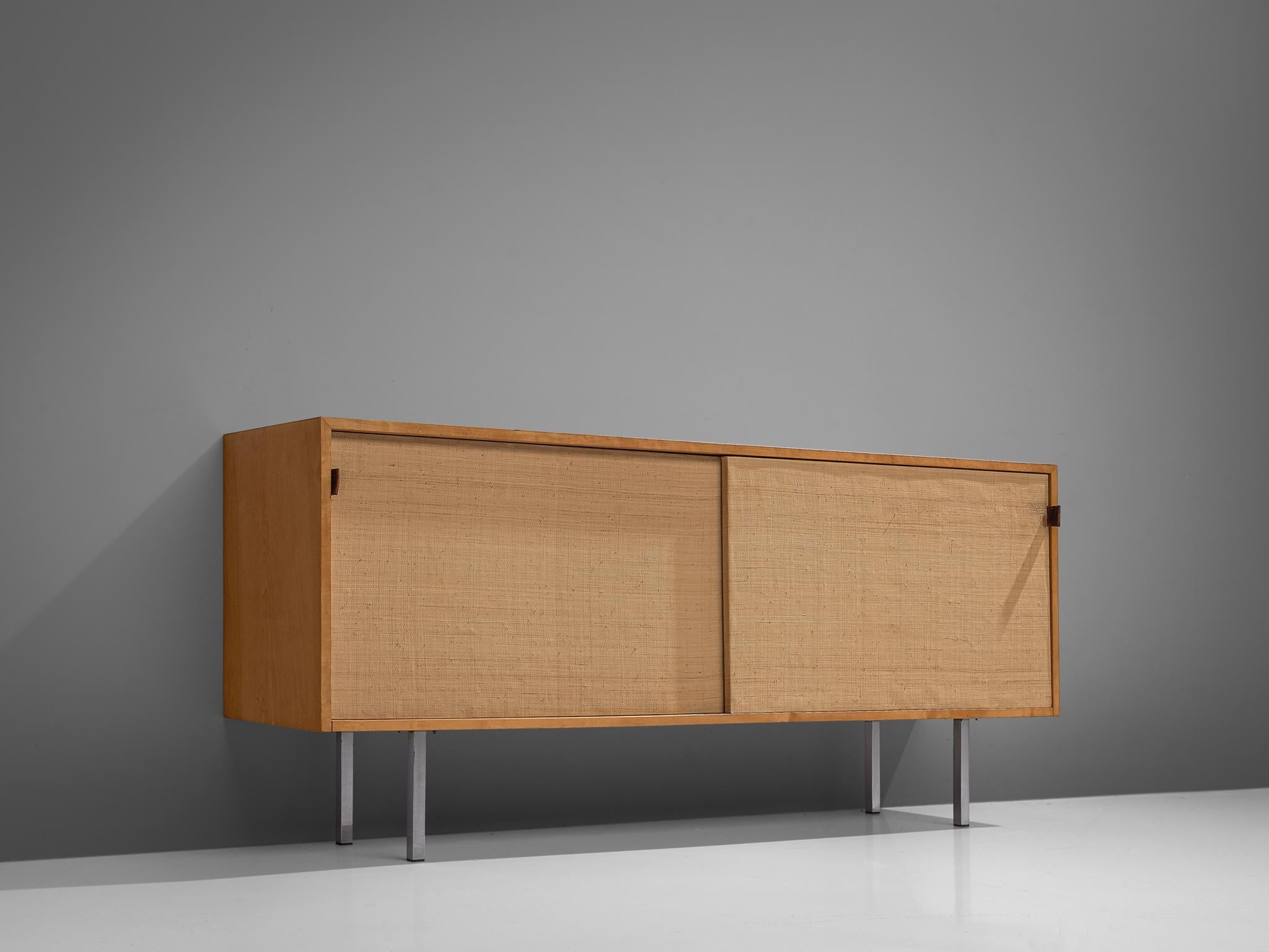 Florence Knoll for Knoll International, sideboard, cane, wood and metal, United States, 1961.

This sideboard is designed by Florence Knoll for Knoll International and was designed for the headquarters of Knoll in Italy. The credenza is executed
