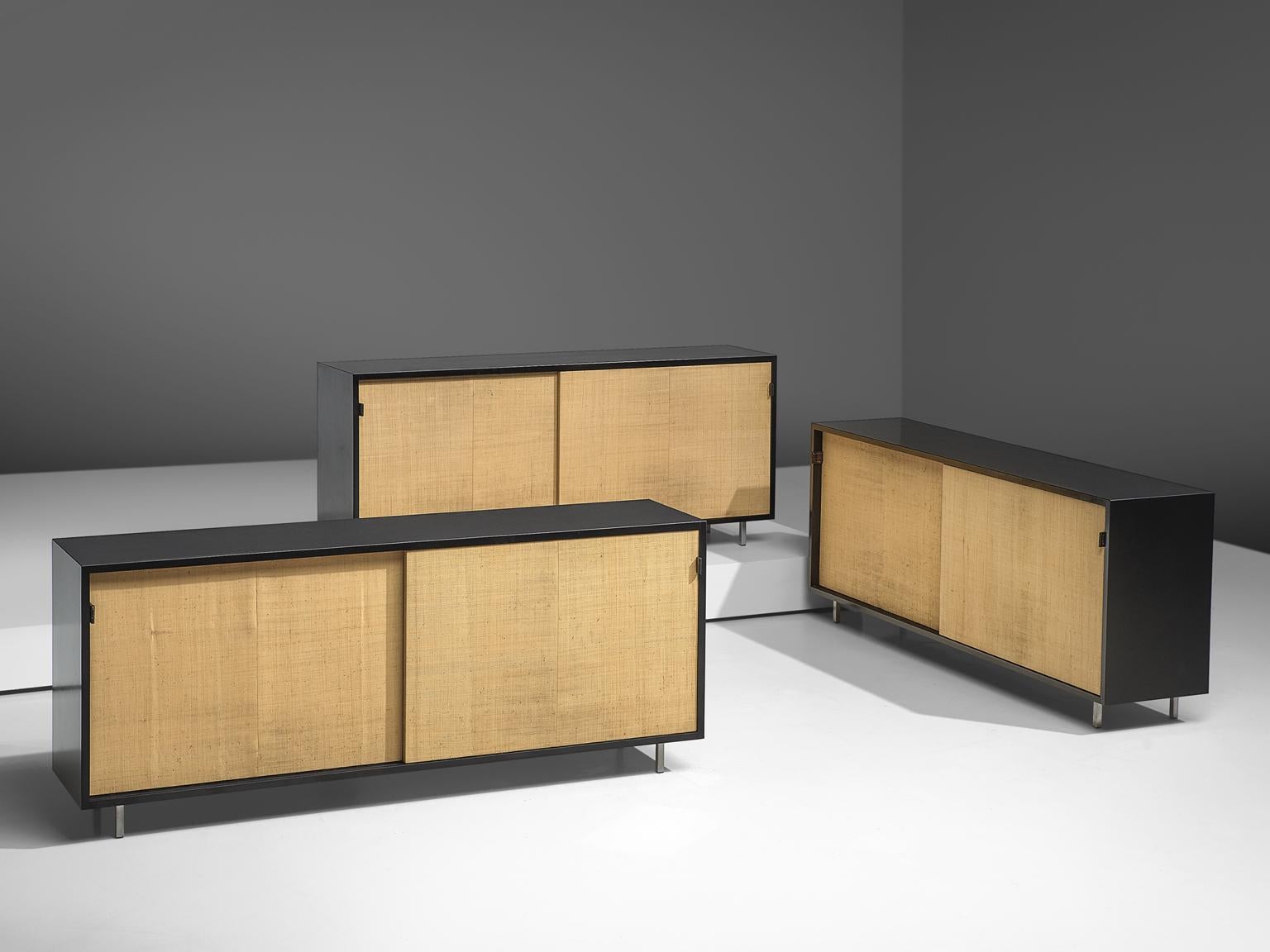Florence Knoll for Knoll, sideboards, ebonized wood, metal, cane, United States, 1961.

These sideboards are designed by Florence Knoll for Knoll International and were meant for the headquarters of Knoll in Italy. The credenzas are executed with