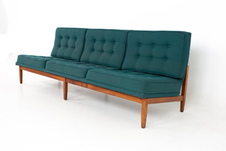 Early Florence Knoll mid century parallel bar walnut and teal green daybed slipper sofa
Sofa measures: 84.25 wide x 28.75 deep x 30.25 high, with a seat height of 15.25 inches high

All pieces of furniture can be had in what we call restored
