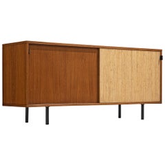 Early Florence Knoll Walnut Credenza with Cane Sliding Door