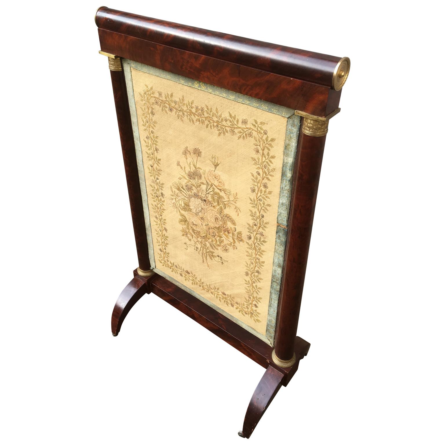 Early French 19th century Empire mahogany and gilt bronze firescreen
Screen has a period embroidered flower decorated insert.

