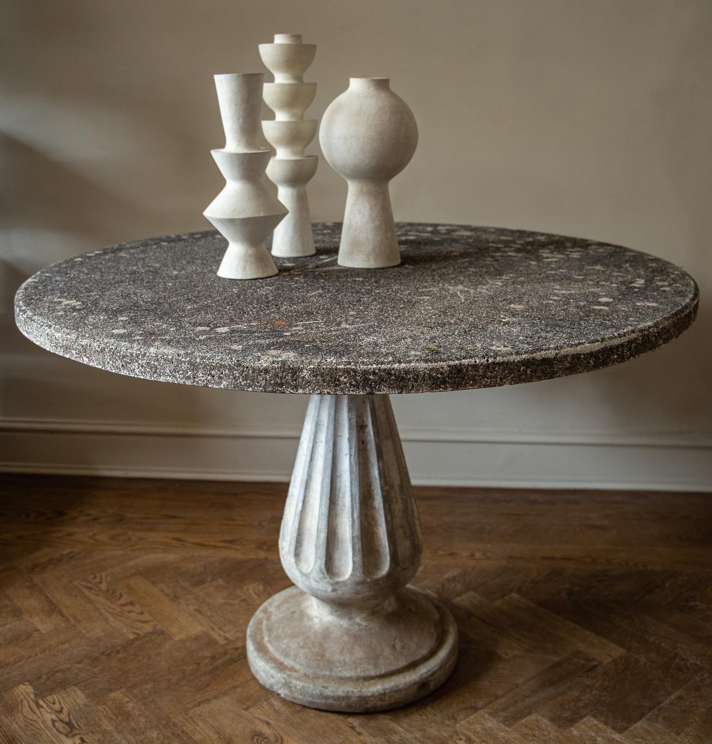 Deco meets Brutalism - an early example of concrete furniture with both modernist and classical form. Featuring sublime table top patina, a timeless piece suitable for indoor/outdoor, circa 1940.

  