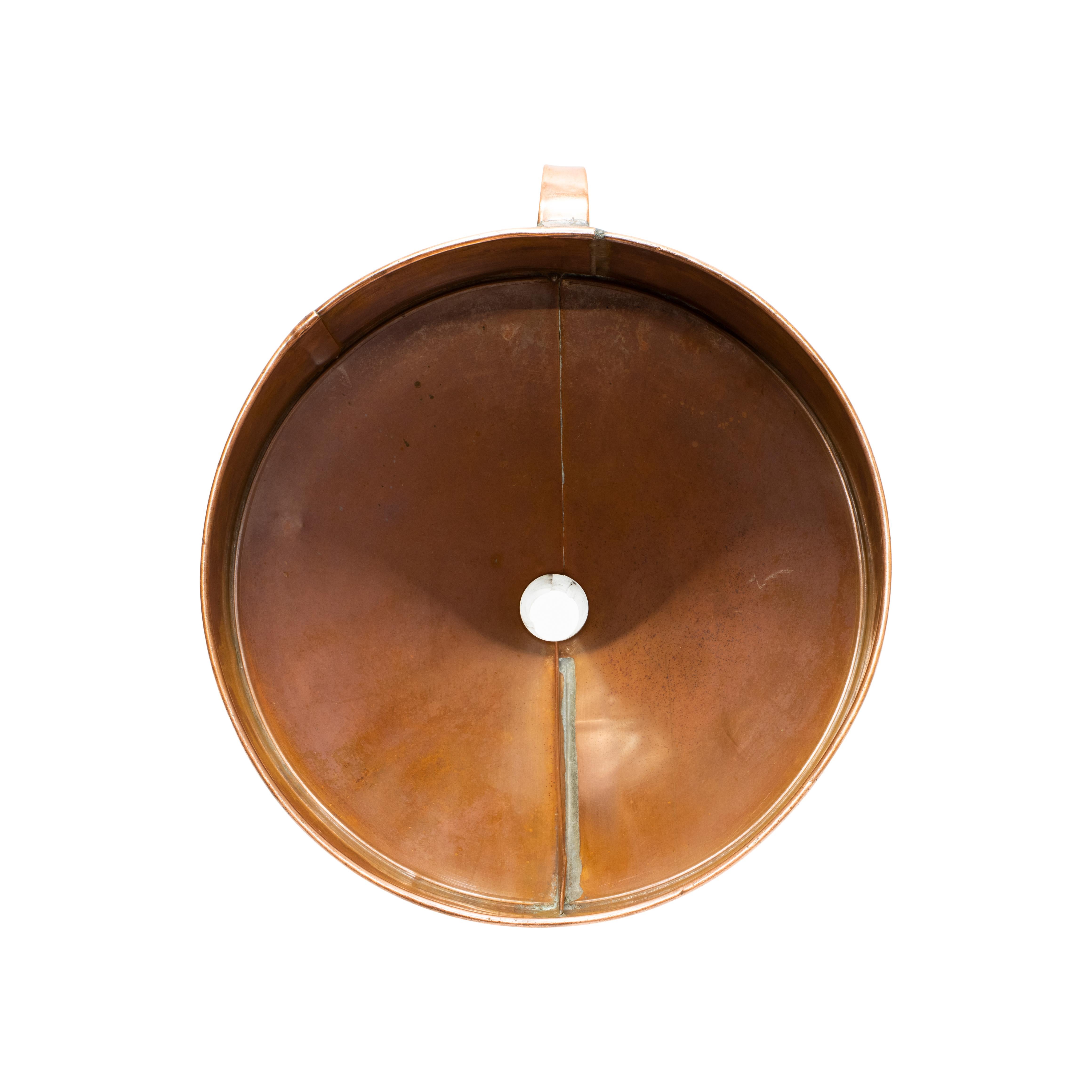 Vintage French large copper wine barrel funnel. The funnel is in beautiful condition with great patina showing it's age. The funnel was used in the wine making process, specifically for pouring the wine into wooden barrels in French vineyards in the