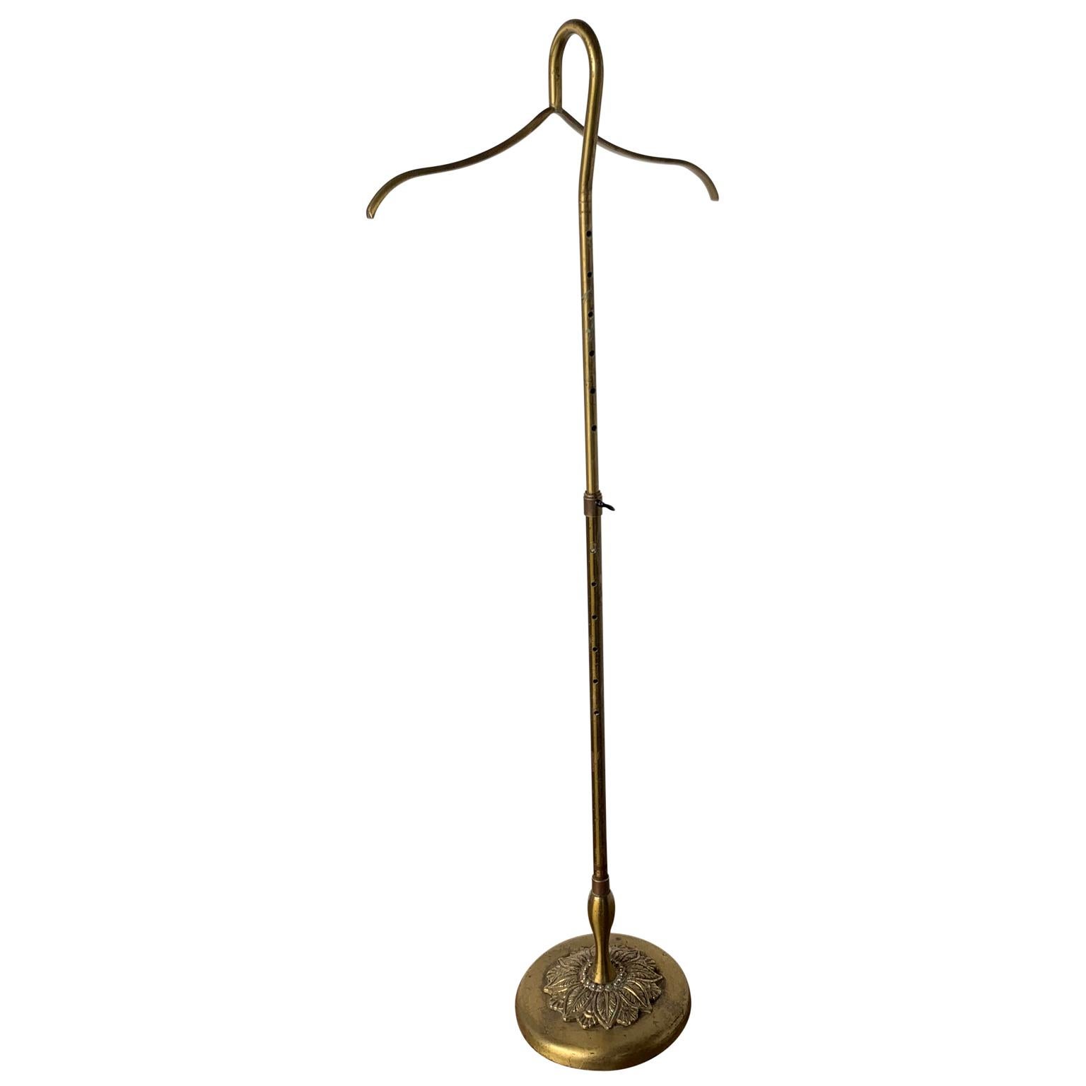 Early French height adjustable brass coat or shirt holder stand.

 