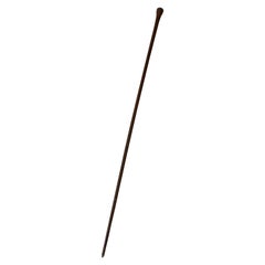 Canne ou bâton de marche français anciennement en cuir fort enduit de laiton supérieur