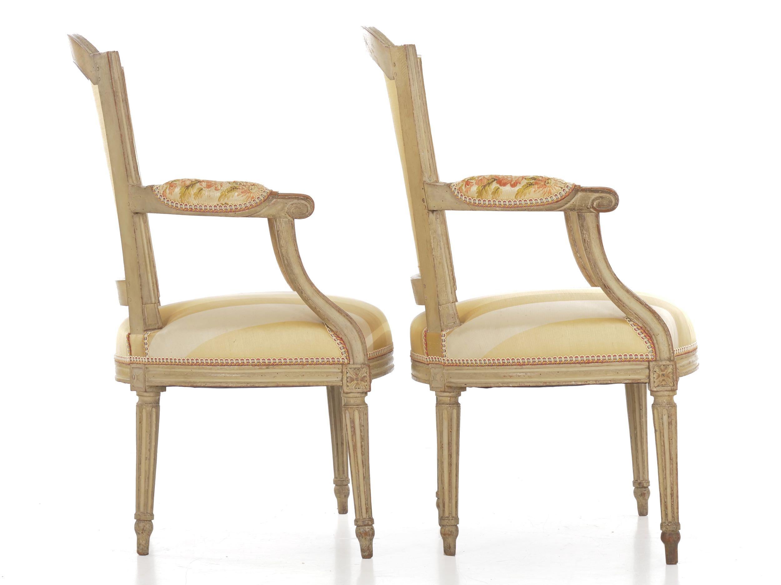 Upholstery Early French Louis XVI Painted Antique Armchairs, a Pair