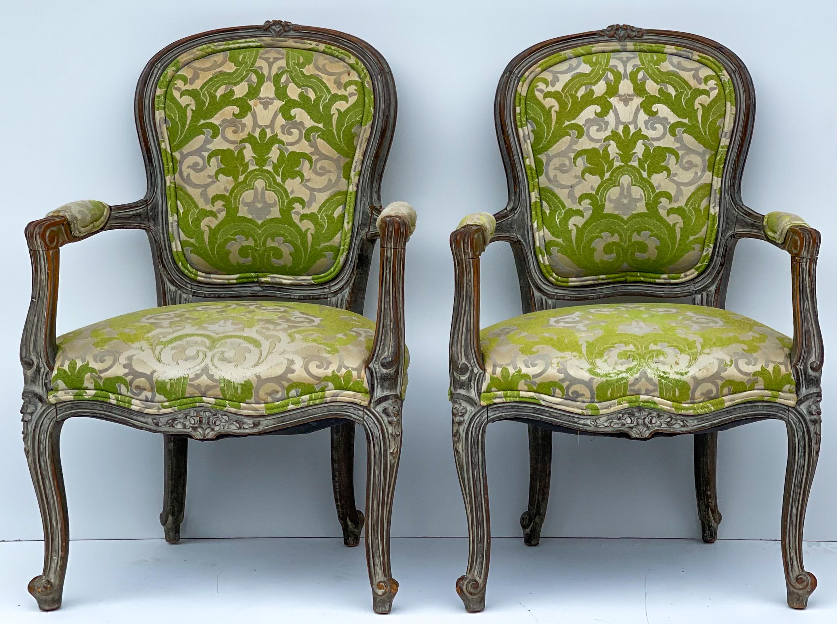 A holiday treat! This is a pair of early French Louis XVI style children’s chairs in vintage chartreuse damask. The gray frame is cerused and in very good condition. One seat shows notable wear but still striking!
 