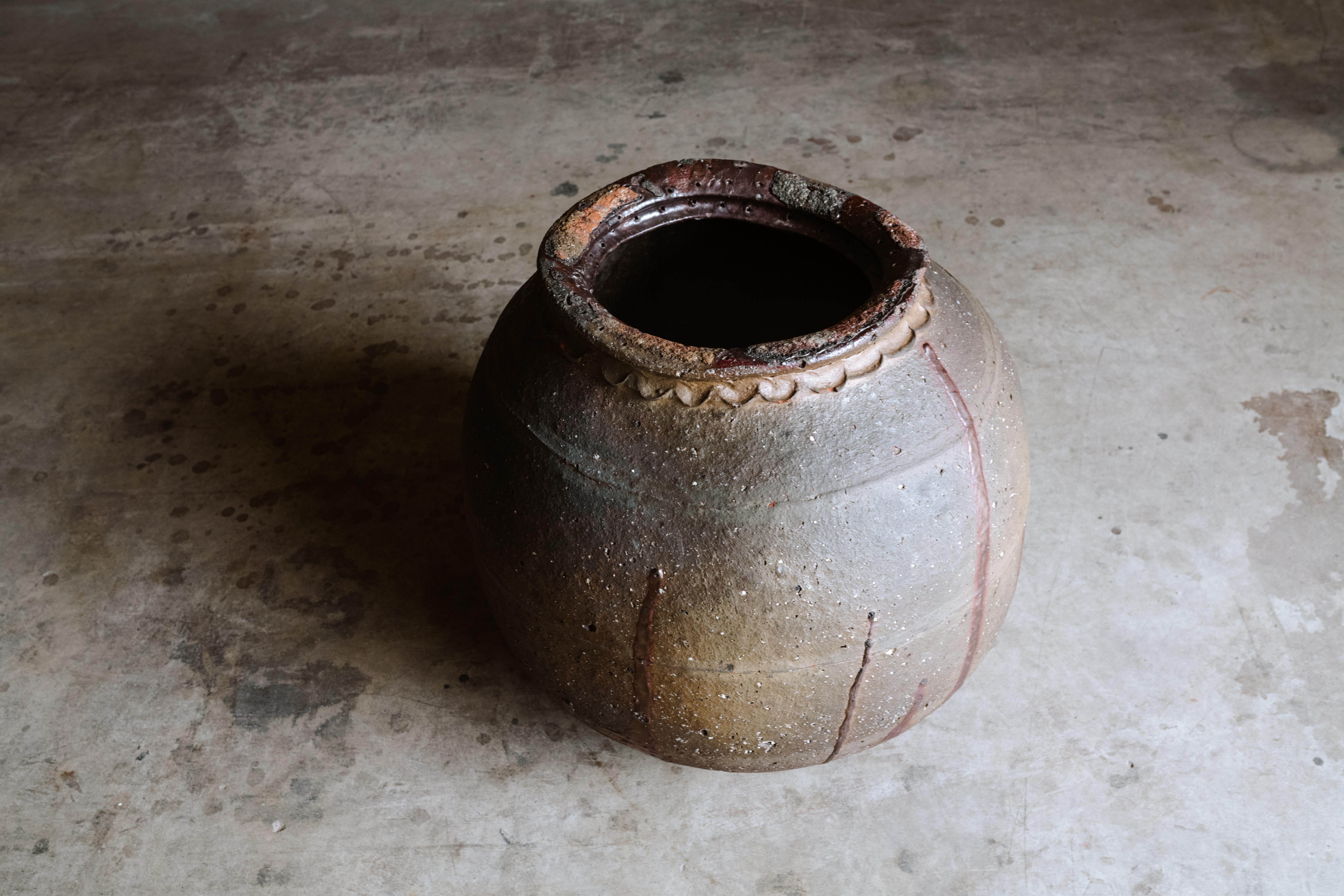 Early French stoneware pot, circa 1890. Amazing original patina and wear. Opening width 8.5