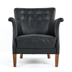 Fauteuil Frits Henningsen ancien en cuir patiné d'origine