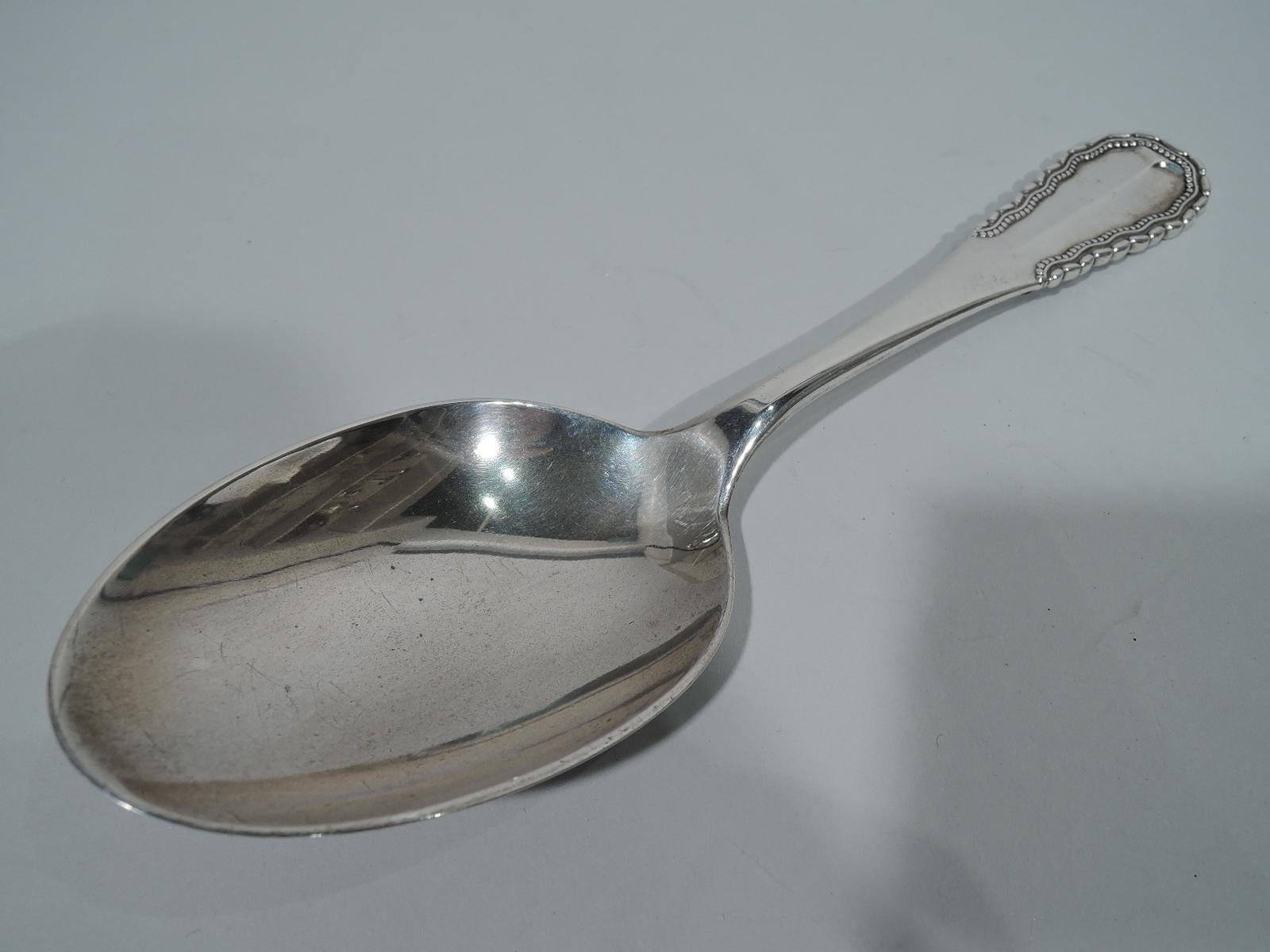 Early 830 silver serving spoon in Viking pattern. Made by Georg Jensen in Copenhagen, circa 1931. A rare piece in a pattern designed by the master, and first made in 1927. It is no longer in production. Fully marked with maker’s stamp (1915-1930),