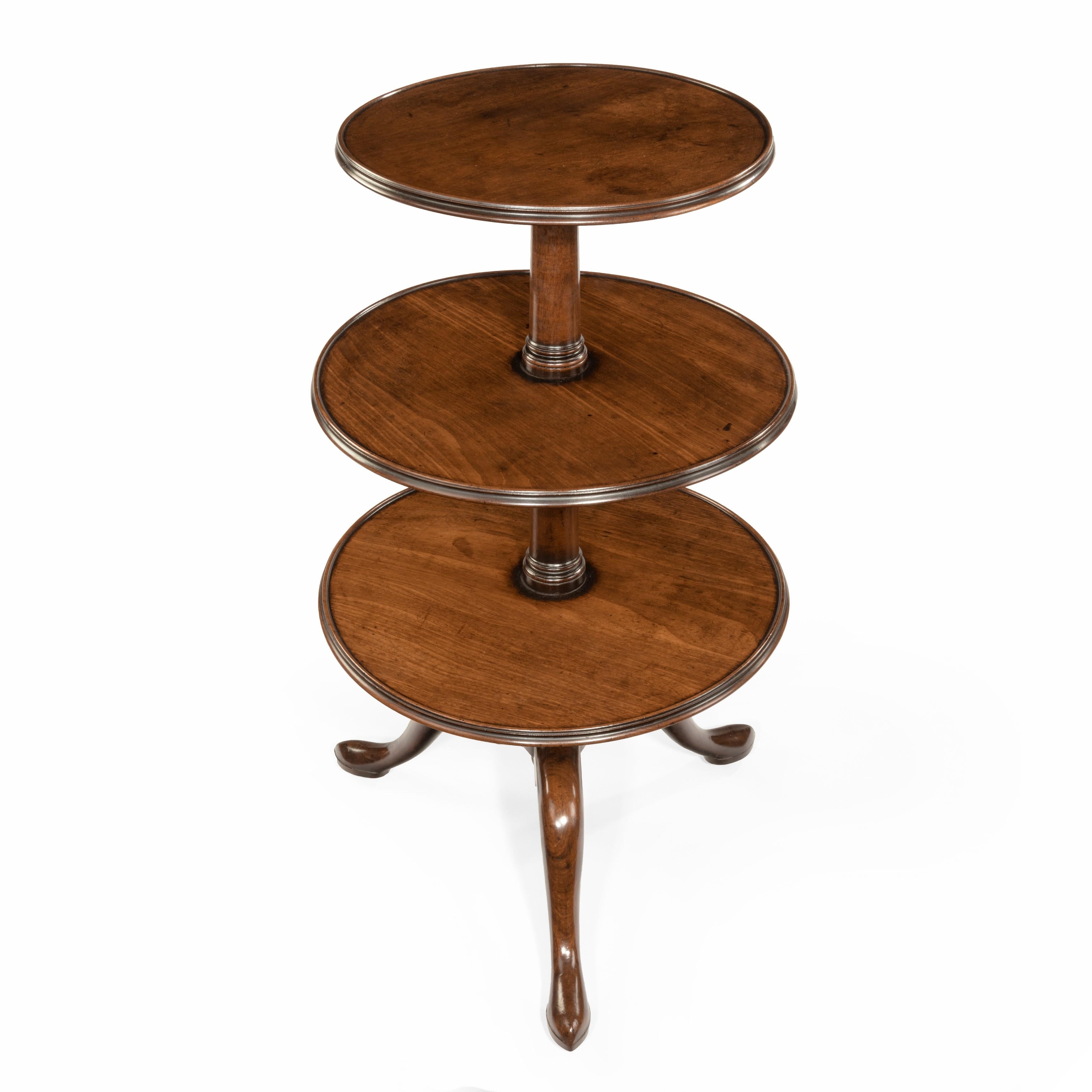 An early George III three-tier mahogany dumb waiter, of typical form with a central tapering support raised on three splayed legs, and three graduated circular shelves. English, circa 1760.
 
Measures: Height 42 inches
Top tier 18 inches in