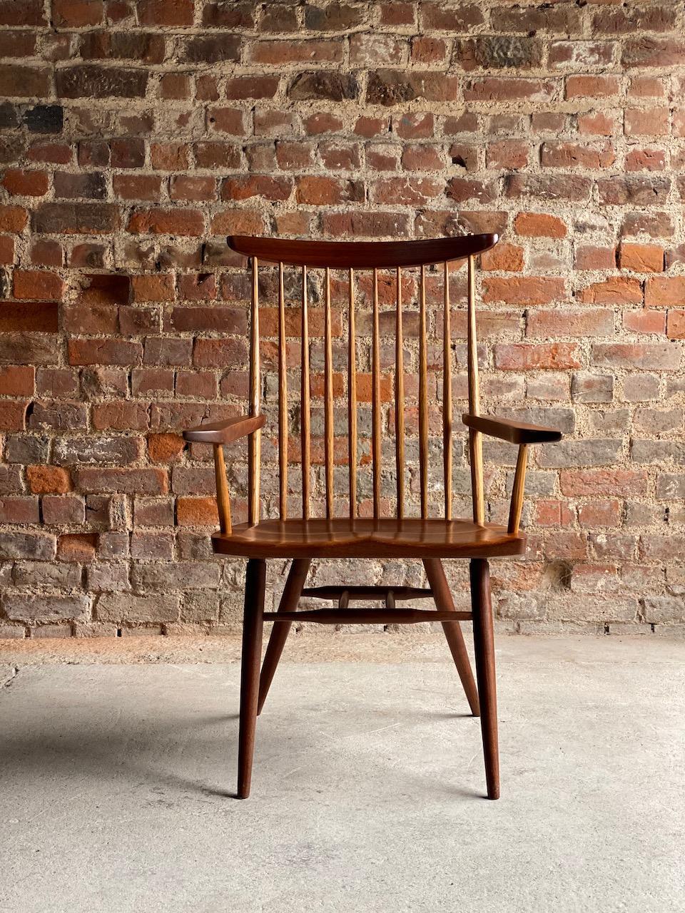 George Nakashima New Chair with arms walnut USA 1967

George Nakashima ’New Chair’ American black walnut and hickory spindle back chair with arms dated 1967, this chair was handcrafted by George Nakashima in his Woodworker complex, New Hope