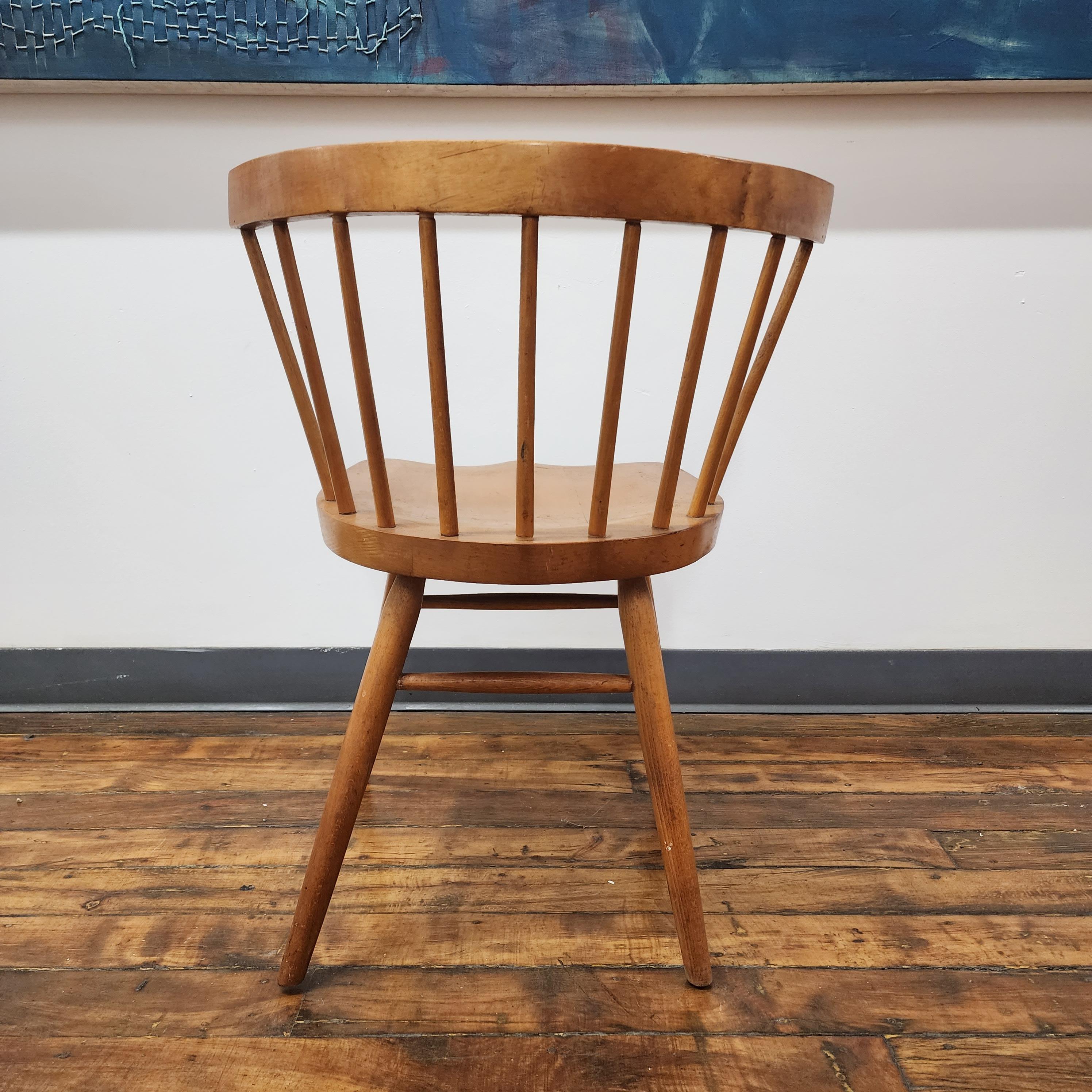 Beautiful early version of the N19 straight back chair in birch. Designed and made by George Nakashima and sold by Knoll associates.  this early version features the tapered seat and marked on the underside with a wax pen 