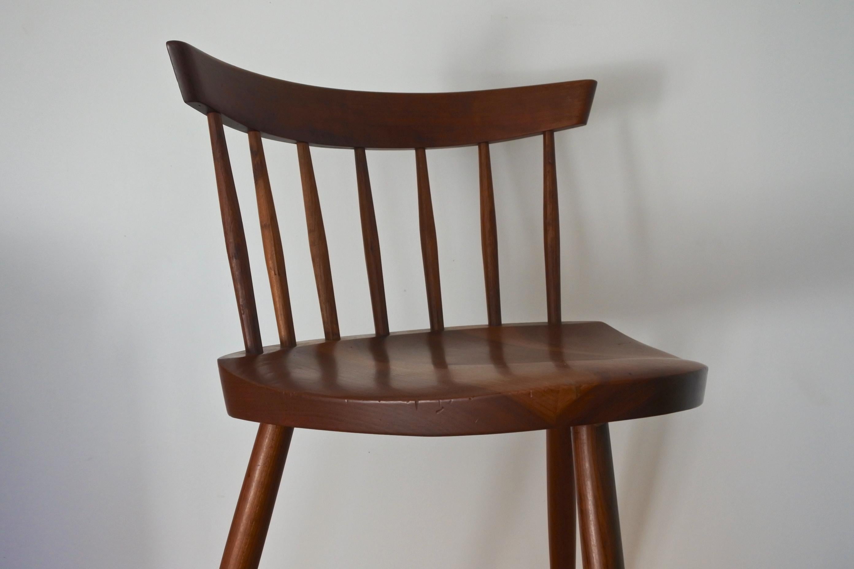 Early vintage version of the Mira chair by George Nakashima in cherrywood.