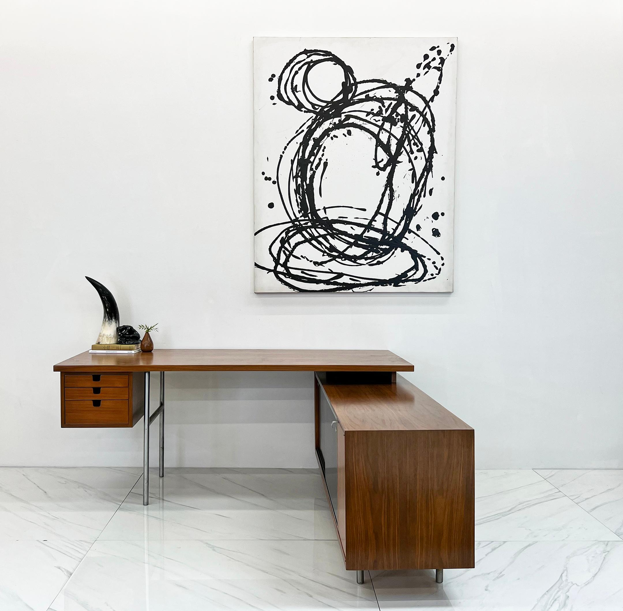Available right now we have this absolutely stunning Mid-Century Modern desk designed by George Nelson for Herman Miller. The Executive Office Group, NO 8000 Series designed in 1949 by George Nelson were the perfect marriage of form, function, and