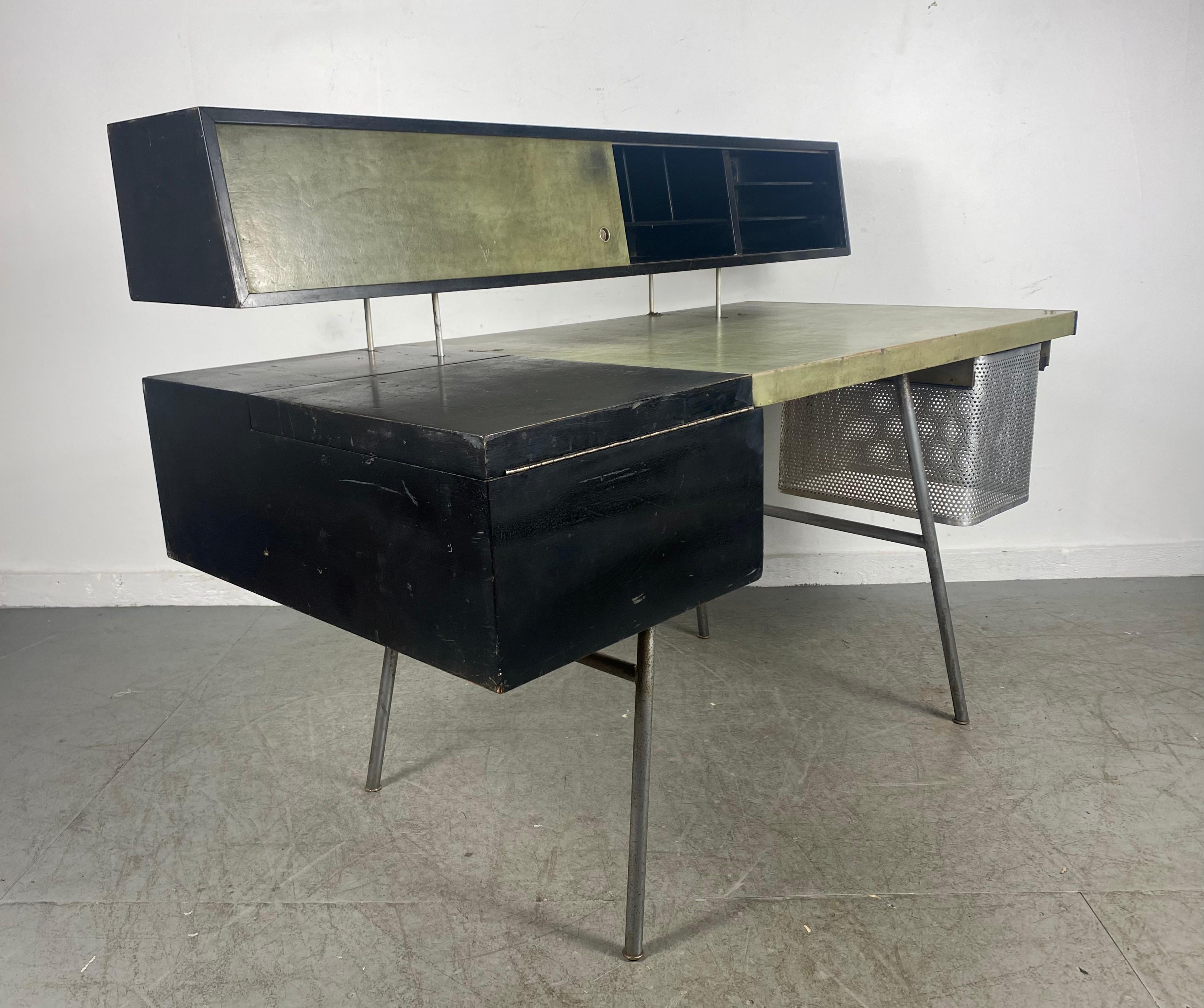 George Nelson for Herman Miller, desk model '4658', walnut, steel, leather, United States, 1946

Rare Color Configuration... Early example,, Unmolested,, all original condition... If you are looking for a super clean (restored) example ..THIS ONE