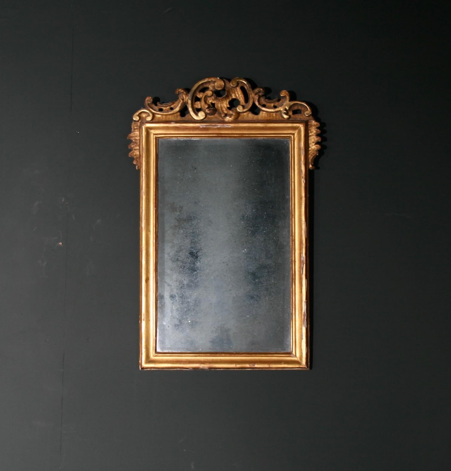 Early Georgian wall Mirror, with original Mercury Plate.

The almost imperceptible bevel of this ultra thin, early Vauxhall plate, is a thing of total beauty.  Purchased in Devon, this past week.

This mirror would enhance any home.