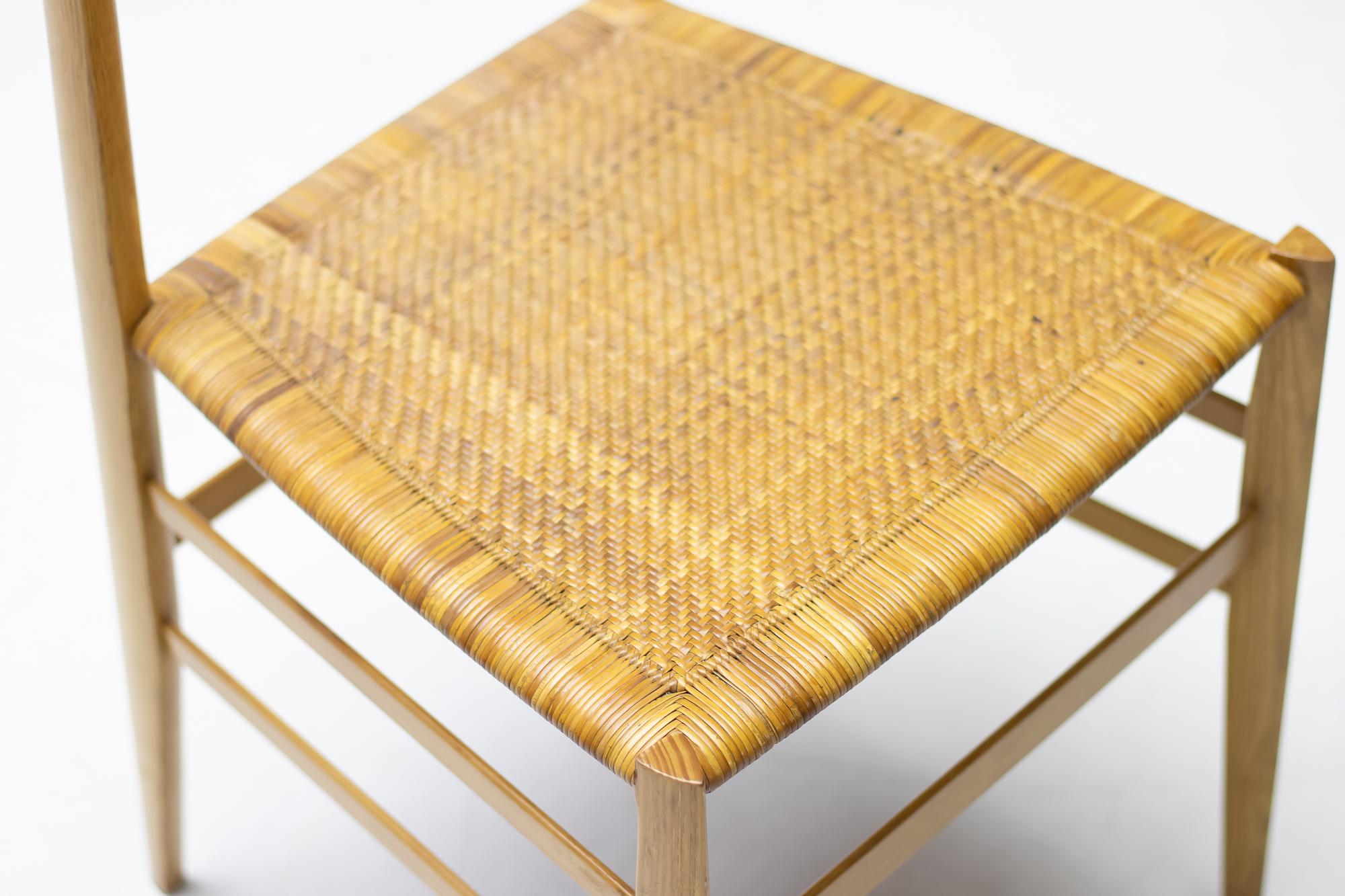 Incredibly lightweight and elegant, this innovative chair was designed by Gio Ponti in 1957 for Cassina.
The chair is in excellent vintage condition and marked with early Cassina label.

Inspired by traditional vernacular chairs produced in the