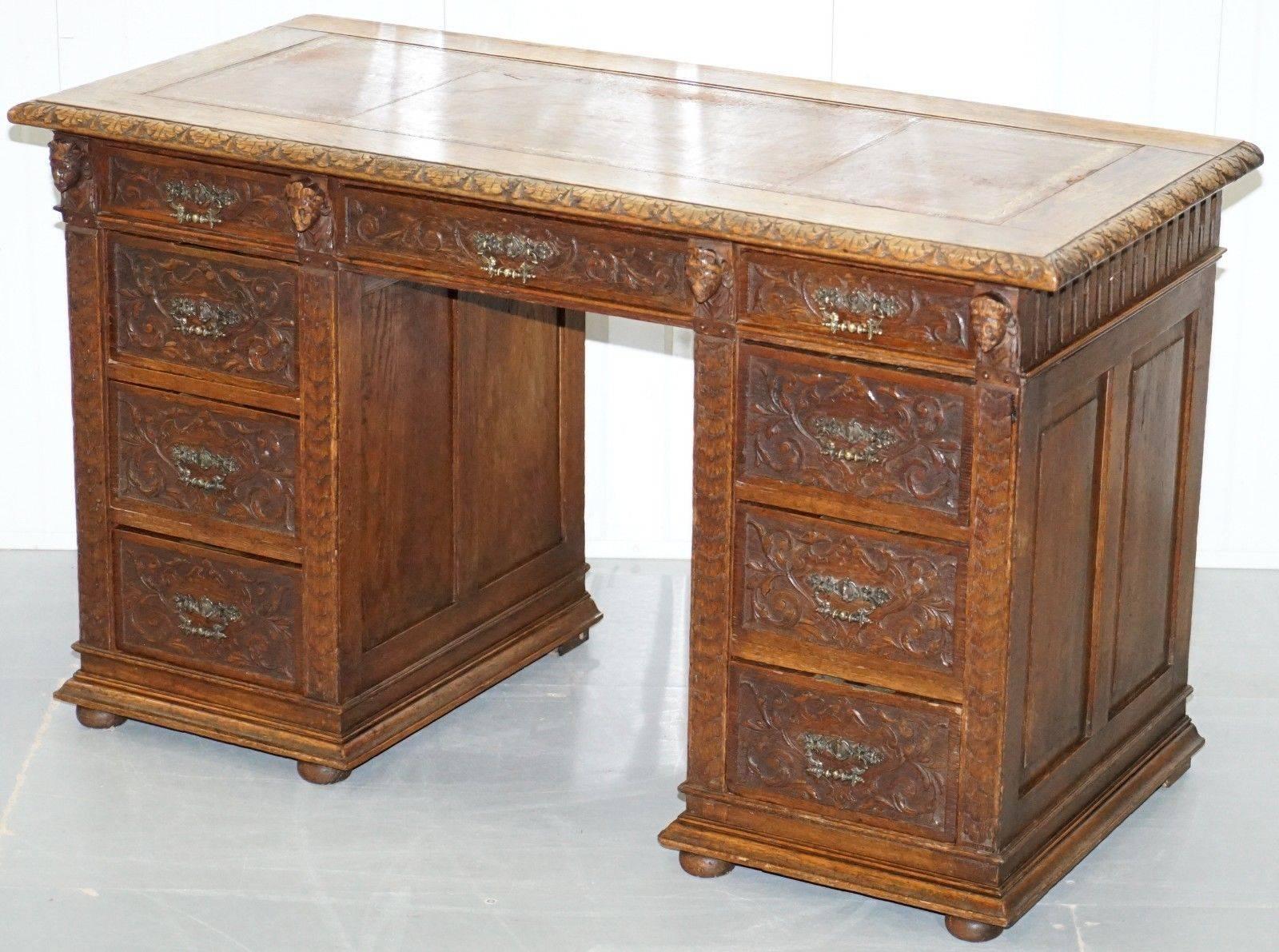 We are delighted to offer for sale this lovely handmade and carved in England twin pedestal desk made in the Gothic manor, circa 1800.

One exceptionally carved and worked piece, the handles are very ornate and solid brass, the almost neoclassical