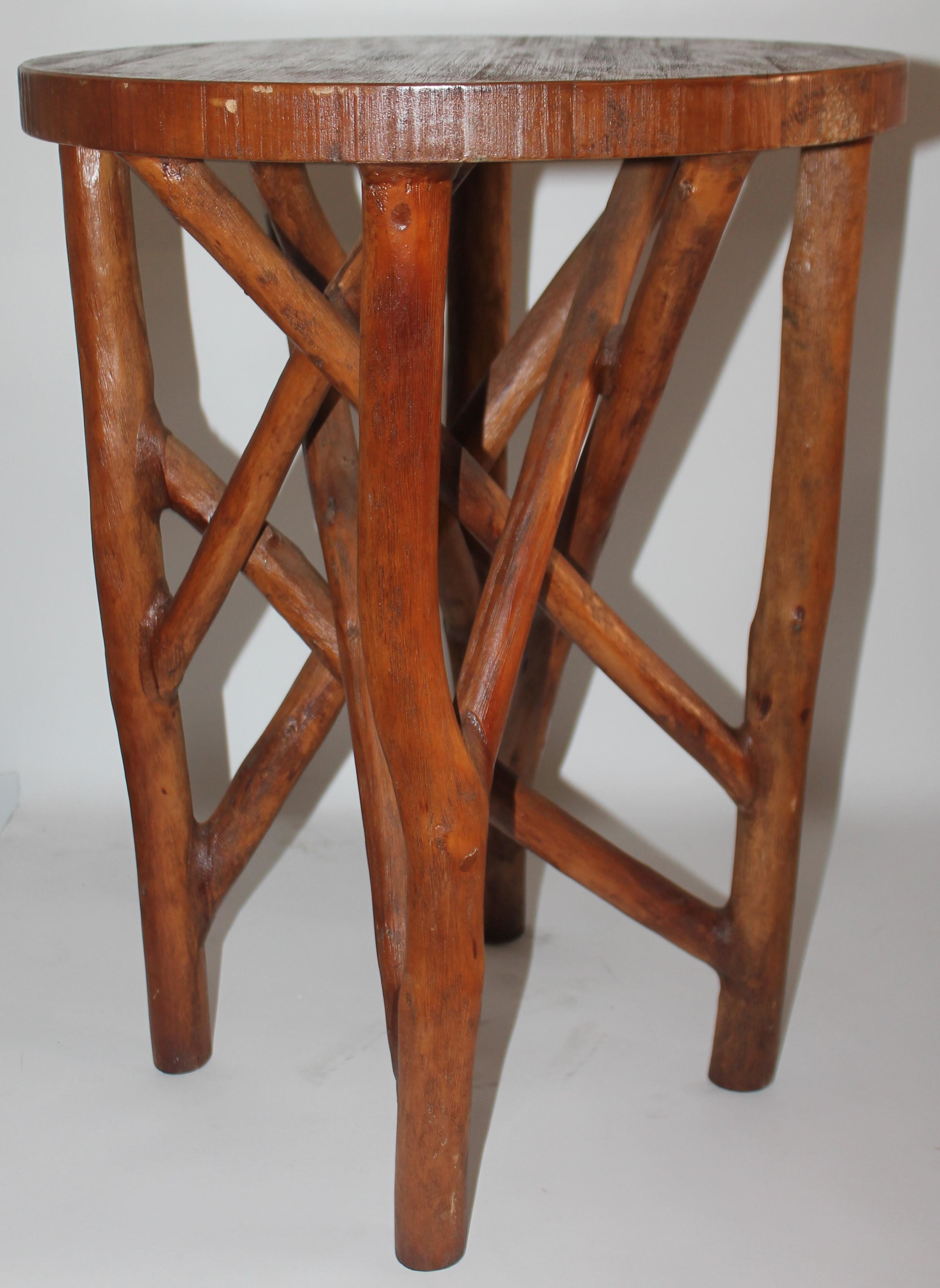 Early hand made cypress side table that is in fine condition and sturdy. Great rustic look. Perfect for a cabin or Indian weaving's collection.