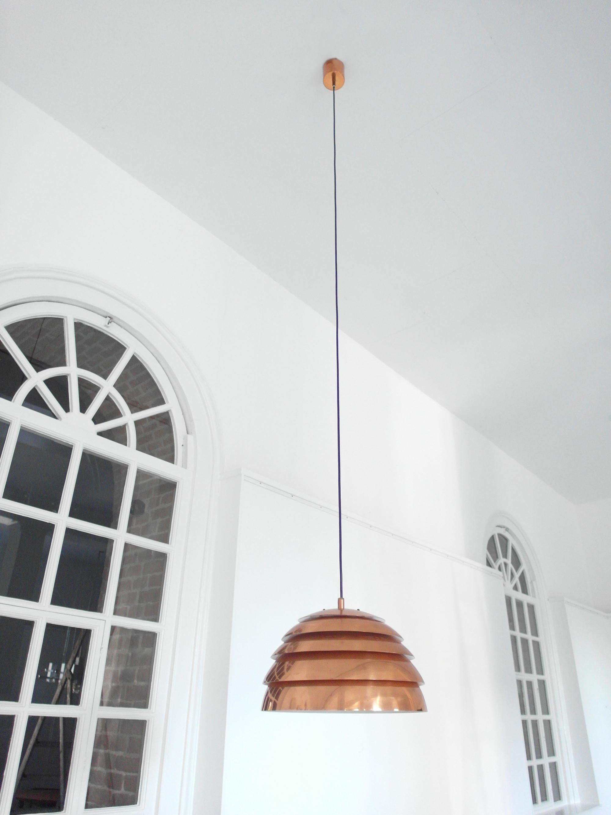 Early and rare pendant lamp designed by Hans-Agne Jakobsson for Markaryd, Sweden, circa 1958. 
Unlike the later copper-plated aluminium lamps from this designer, this is an early, heavy edition of the lamp, made of solid copper. The lamp is white