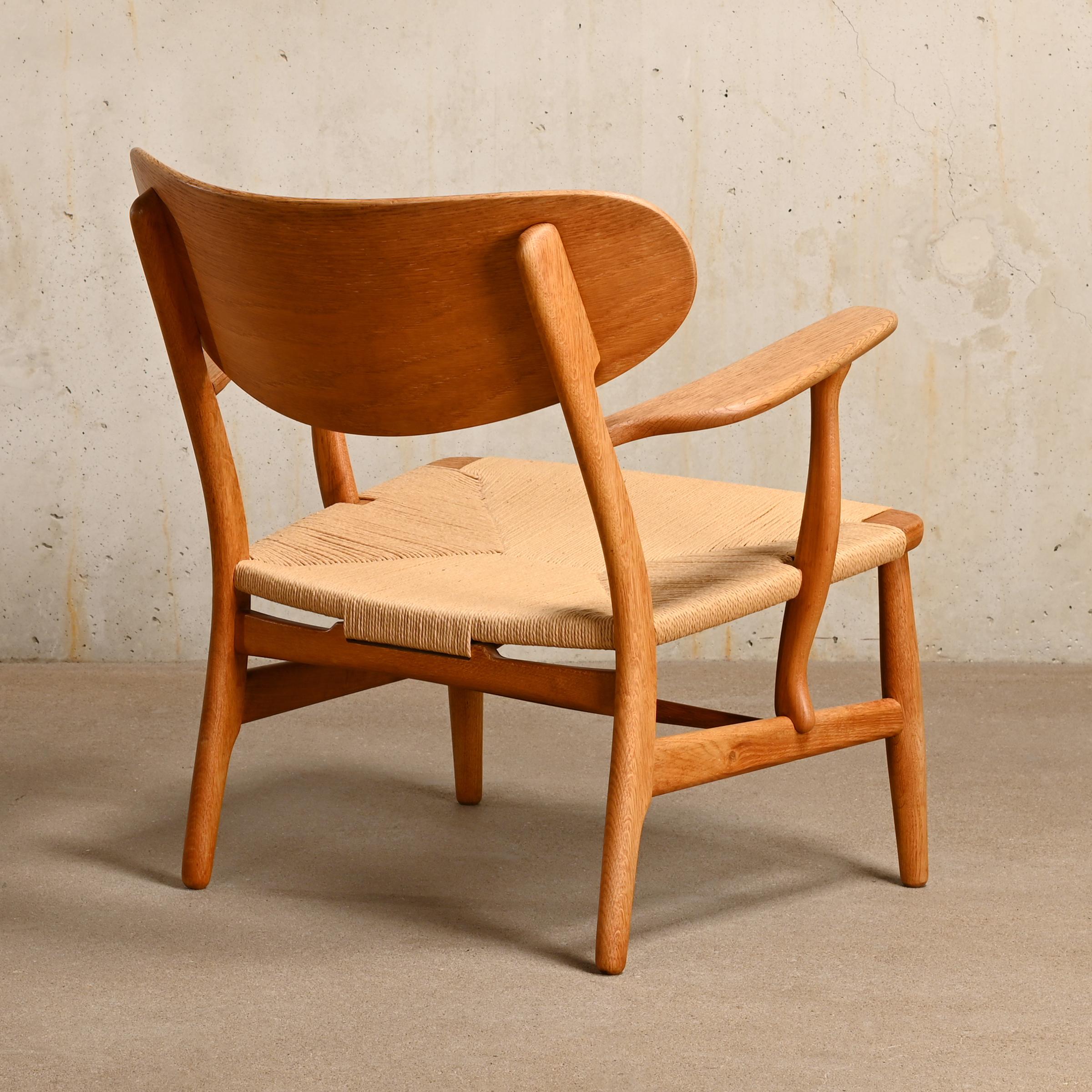 Scandinavian Modern Early Hans J. Wegner CH22 Easy Chair in Oak and Paper-Cord for Carl Hansen & Son