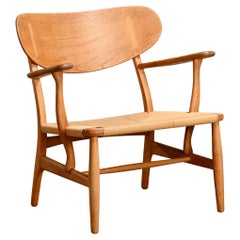 Early Hans J. Wegner CH22 Easy Chair in Oak and Paper-Cord for Carl Hansen & Son