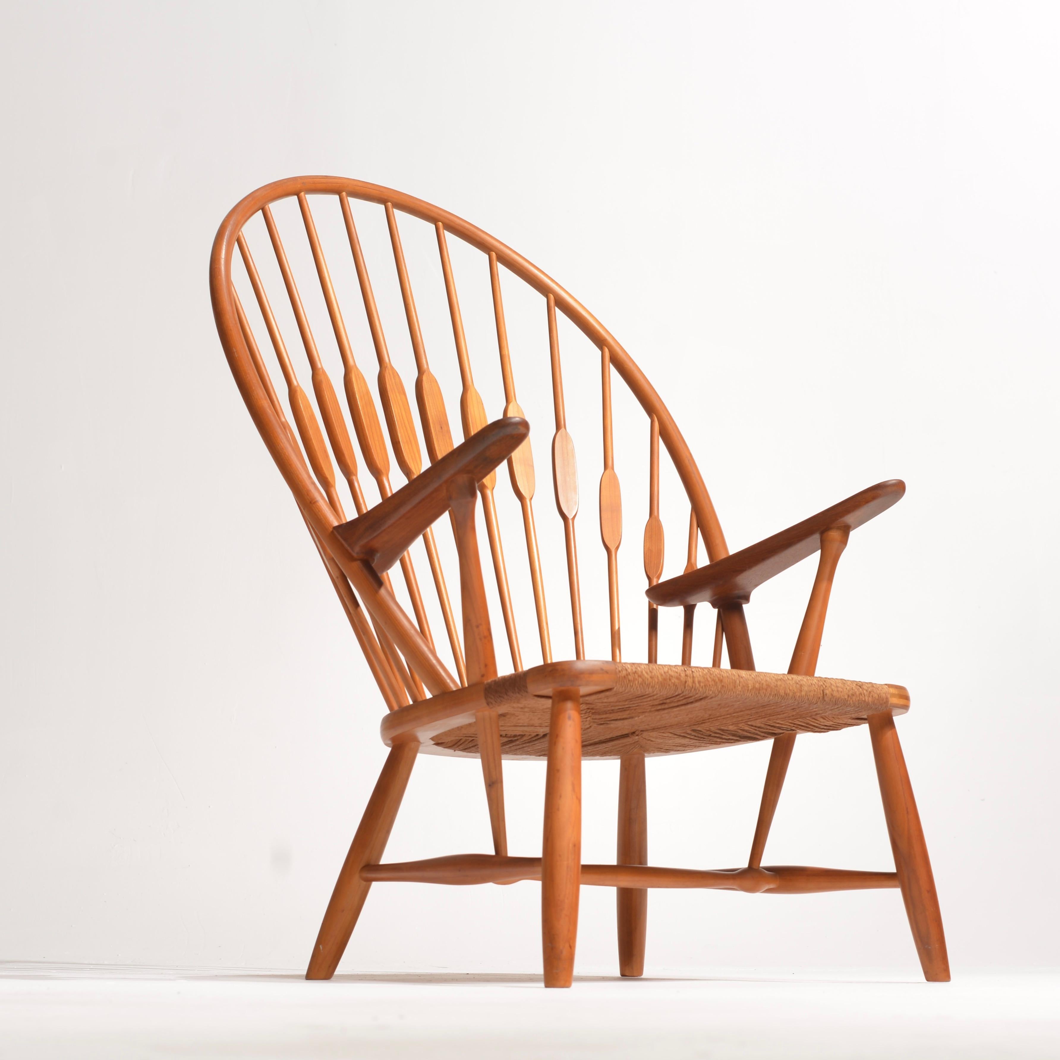 Hans Wegner JH-550 Peacock chair for Johannes Hansen Iconic 'Peacock' Chair Model JH-550 produced by furniture maker Johannes Hansen in Denmark. Inspired by a traditional English Windsor chair, the Peacock chair is one of Wegner's finest examples of