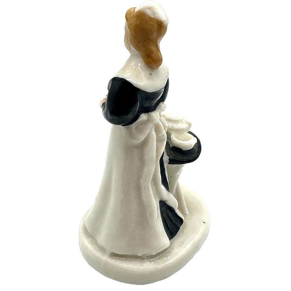 „Early Harvey Girl“ Waitress-Figur aus dem Fred Harvey Hotel & Restaurant (Moderne der Mitte des Jahrhunderts) im Angebot