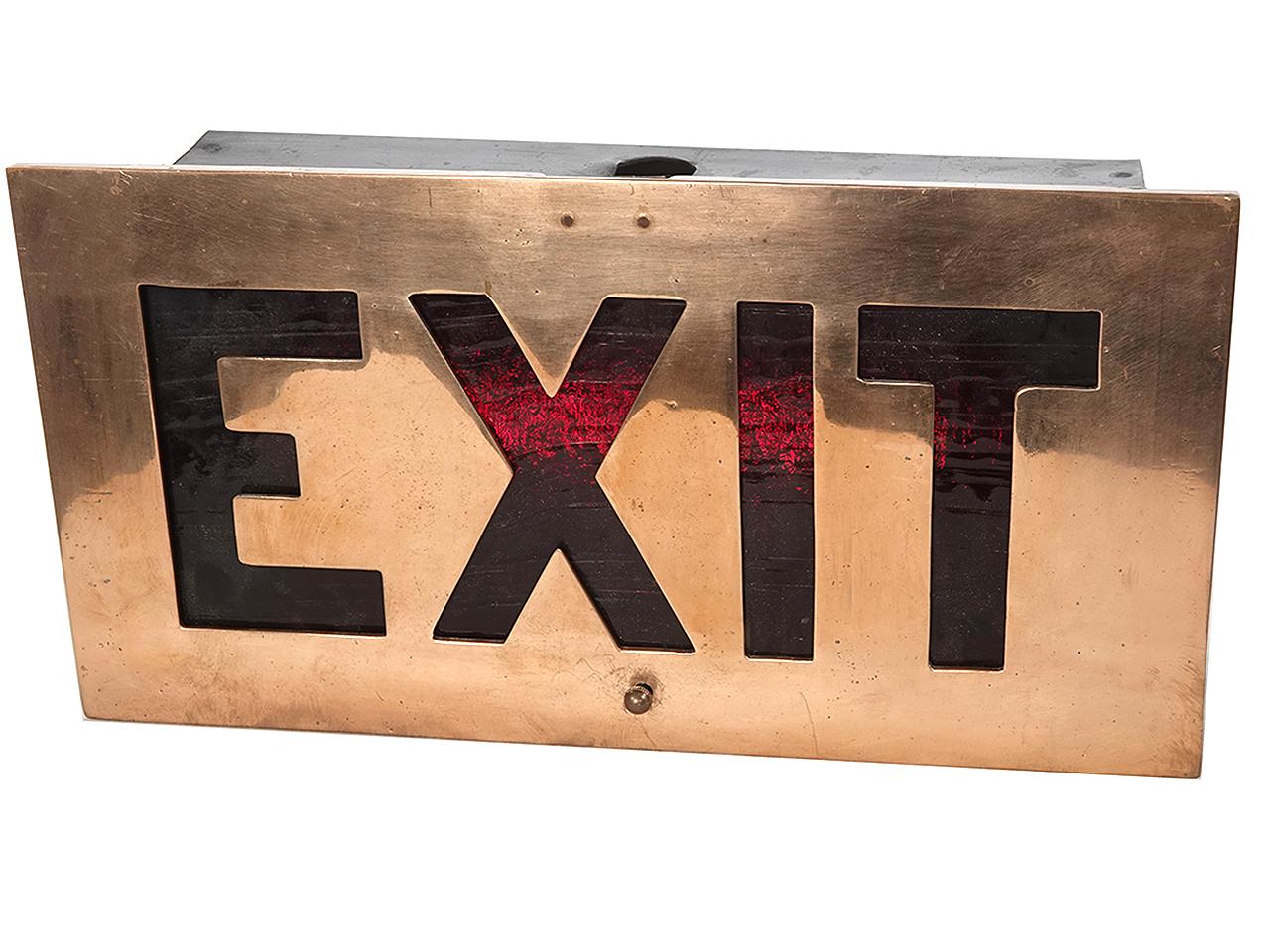 We have a collection of there heavy bronze EXIT signs. They were salvaged from a 1920-30s 5th Avenue Manhattan hotel. The front plate is .25 inch thick bronze with a textured red glass behind it. There are priced per sign so you can buy just on or