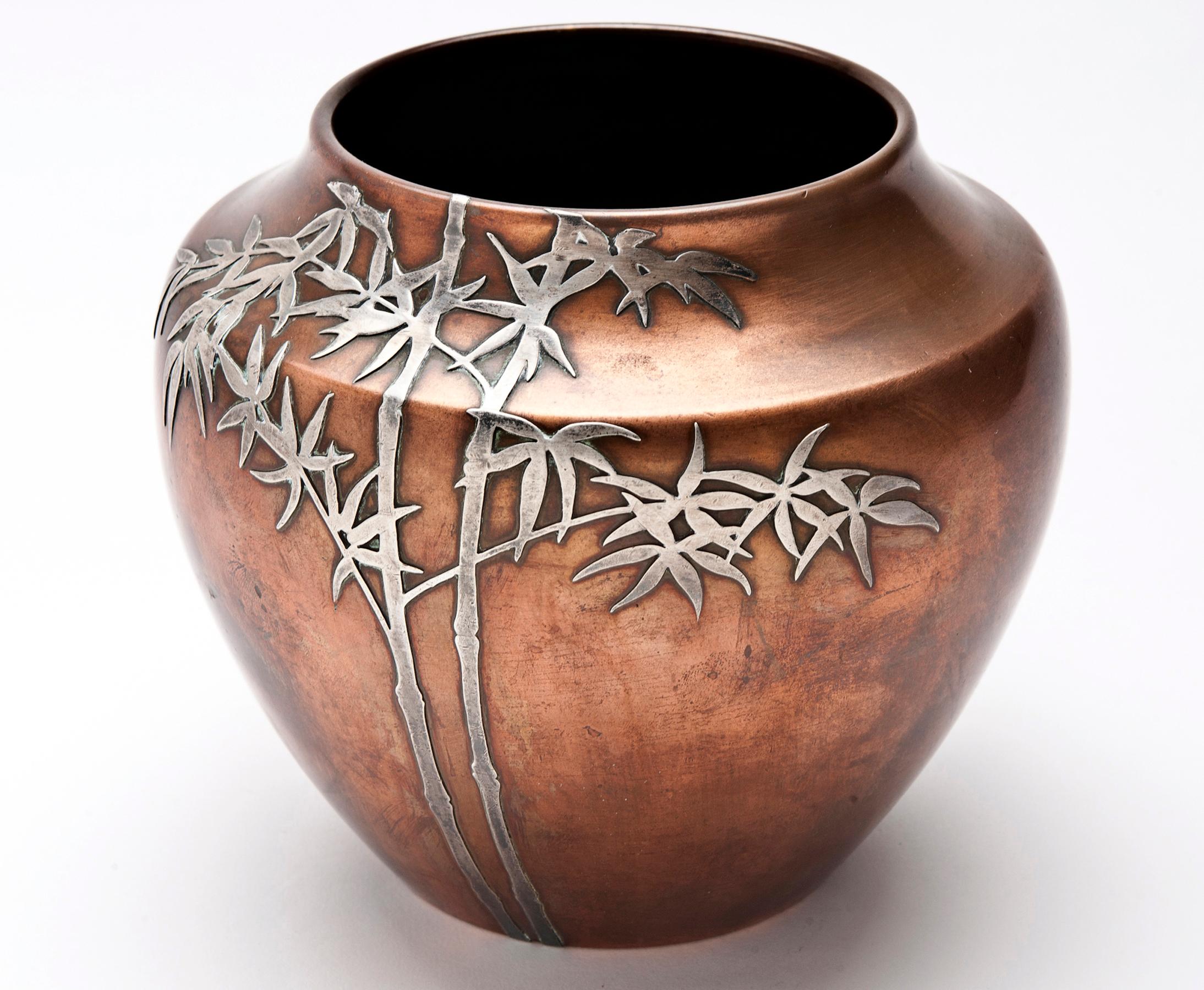 Stunning antique Heintz bronze jardinière with bamboo design overlaid in sterling silver.
This piece is stamped on the bottom; 