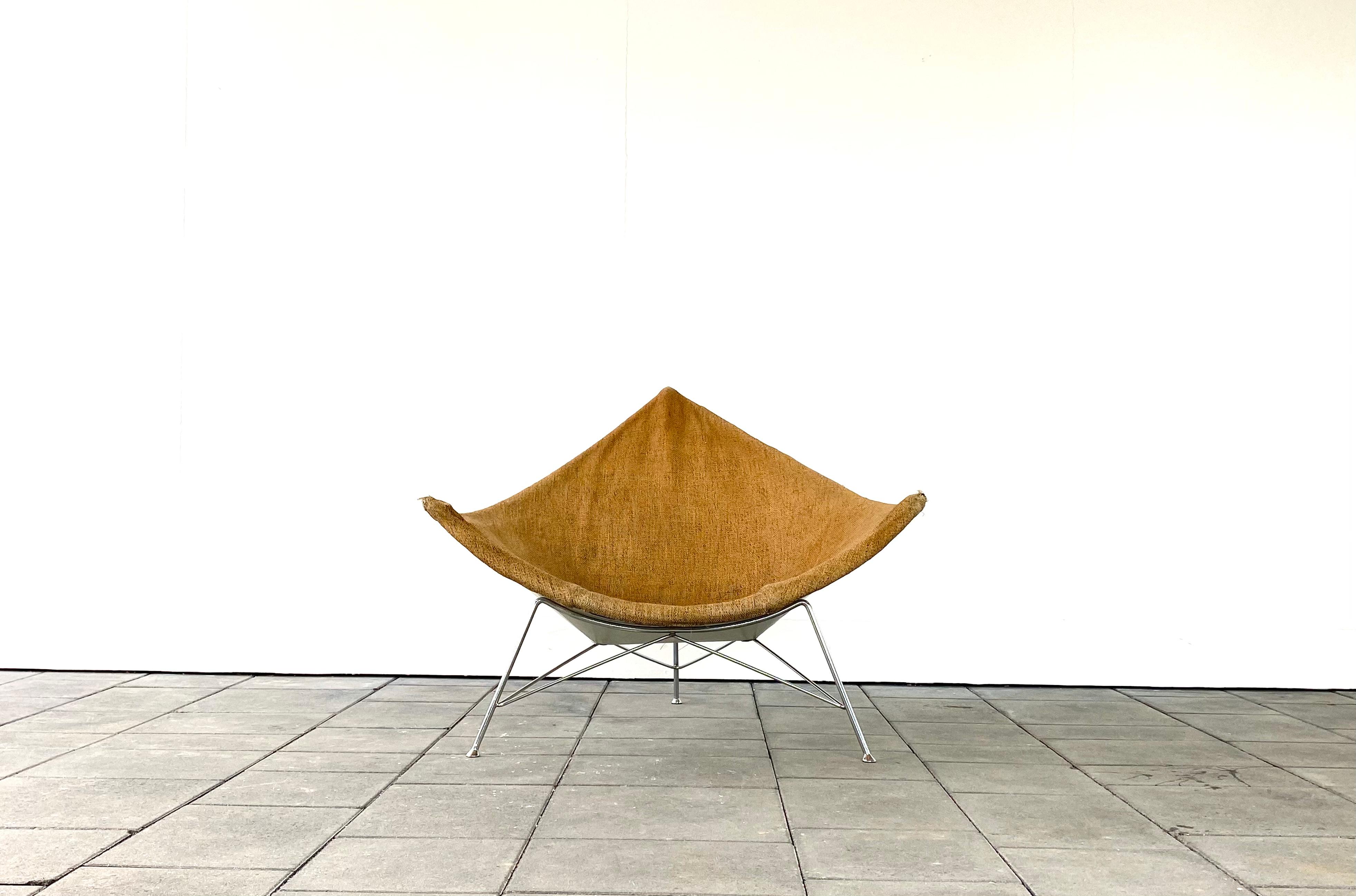 Early Herman Miller Coconut lounge chair.

Manufactured ca. in 1960. Upholstery in brown fabric, coated shell from bent steel, chromed plated steel base.

Chair will need reupholstery !

The Coconut Lounge Chair’s three-point triangular shell,