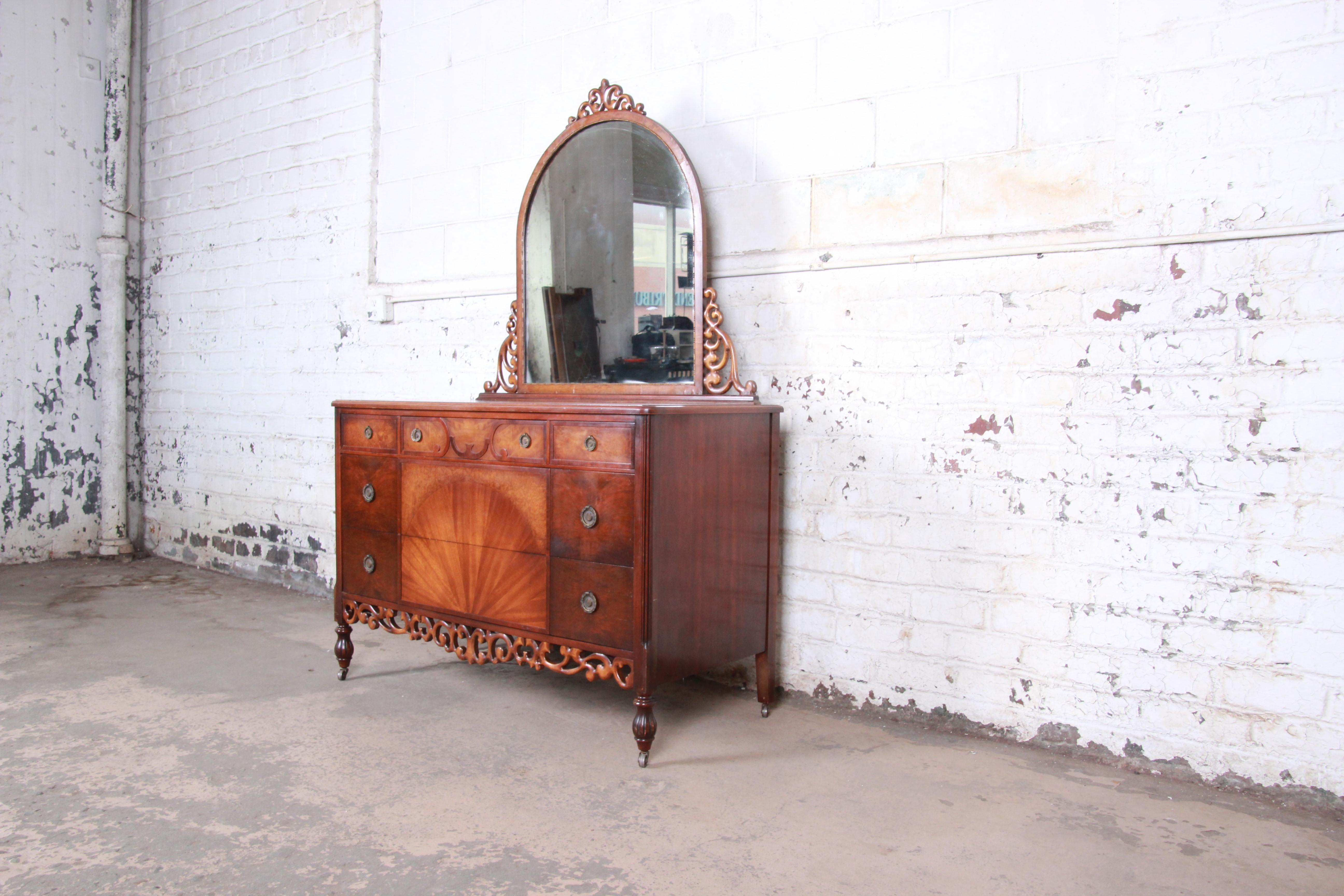 Antique five-drawer walnut dresser with mirror

Early Herman Miller 