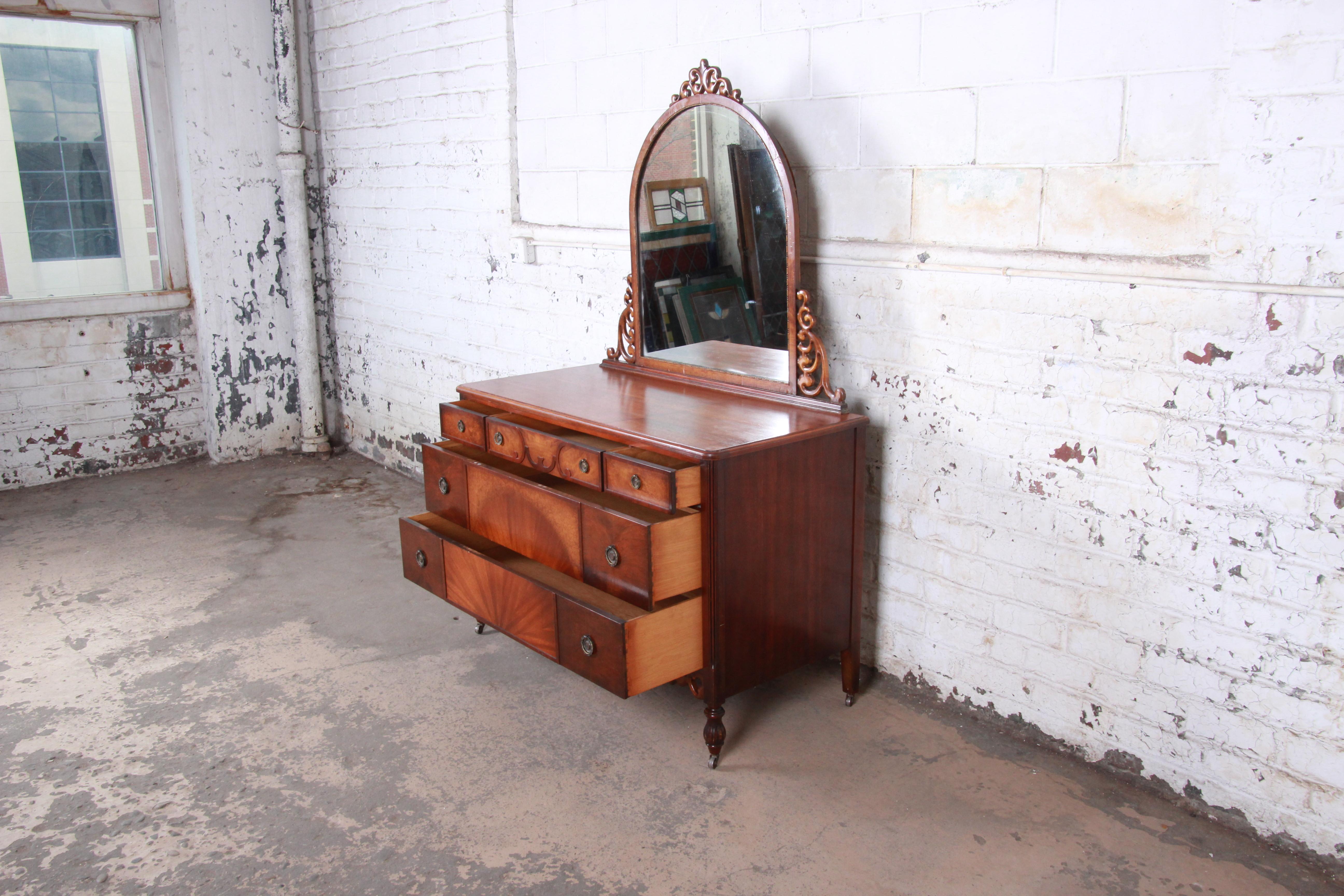 Jacobean Early Herman Miller Ornate Walnut and Burl Wood Dresser with Mirror, circa 1920s