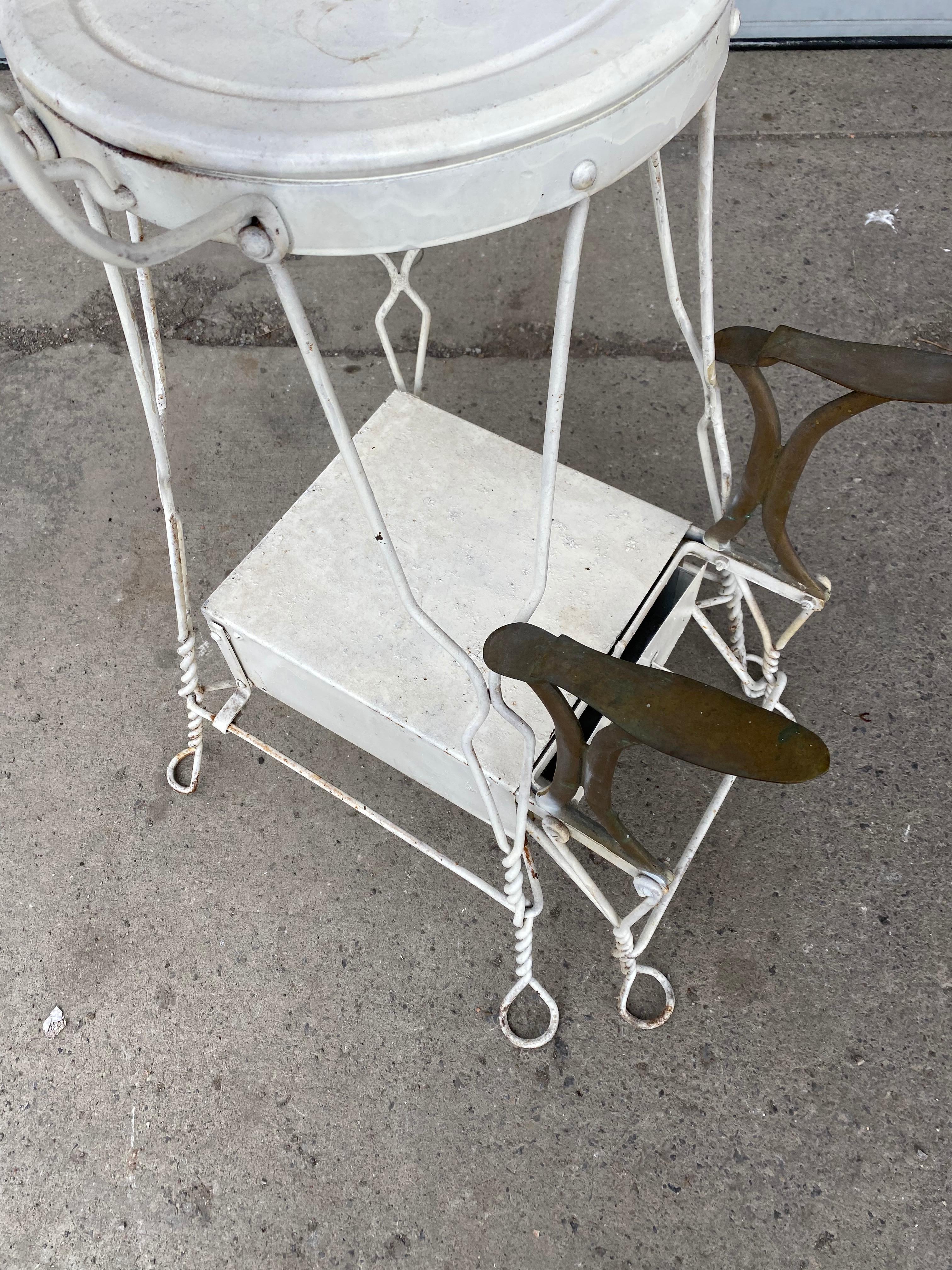 Early 20thc. Ice cream parlour style wire shoeshine chair by Royal Products Chicago, seldom seen, retains original bottom drawer for polish, brushes, rags etc.