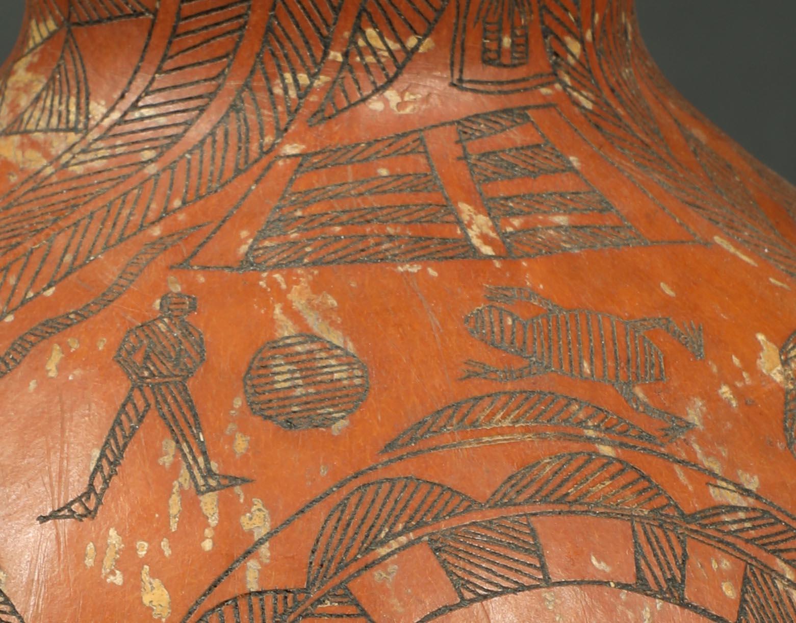 Sonajero antiguo de calabaza tallada incisa del Congo África Hombre Cebra Cocodrilo Rinoceronte Tallado a mano en venta