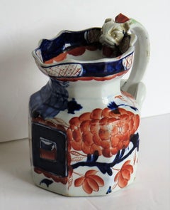 Cruche ancienne en grès avec poignée en forme de dragon peinte:: Staffordshire:: vers 1820